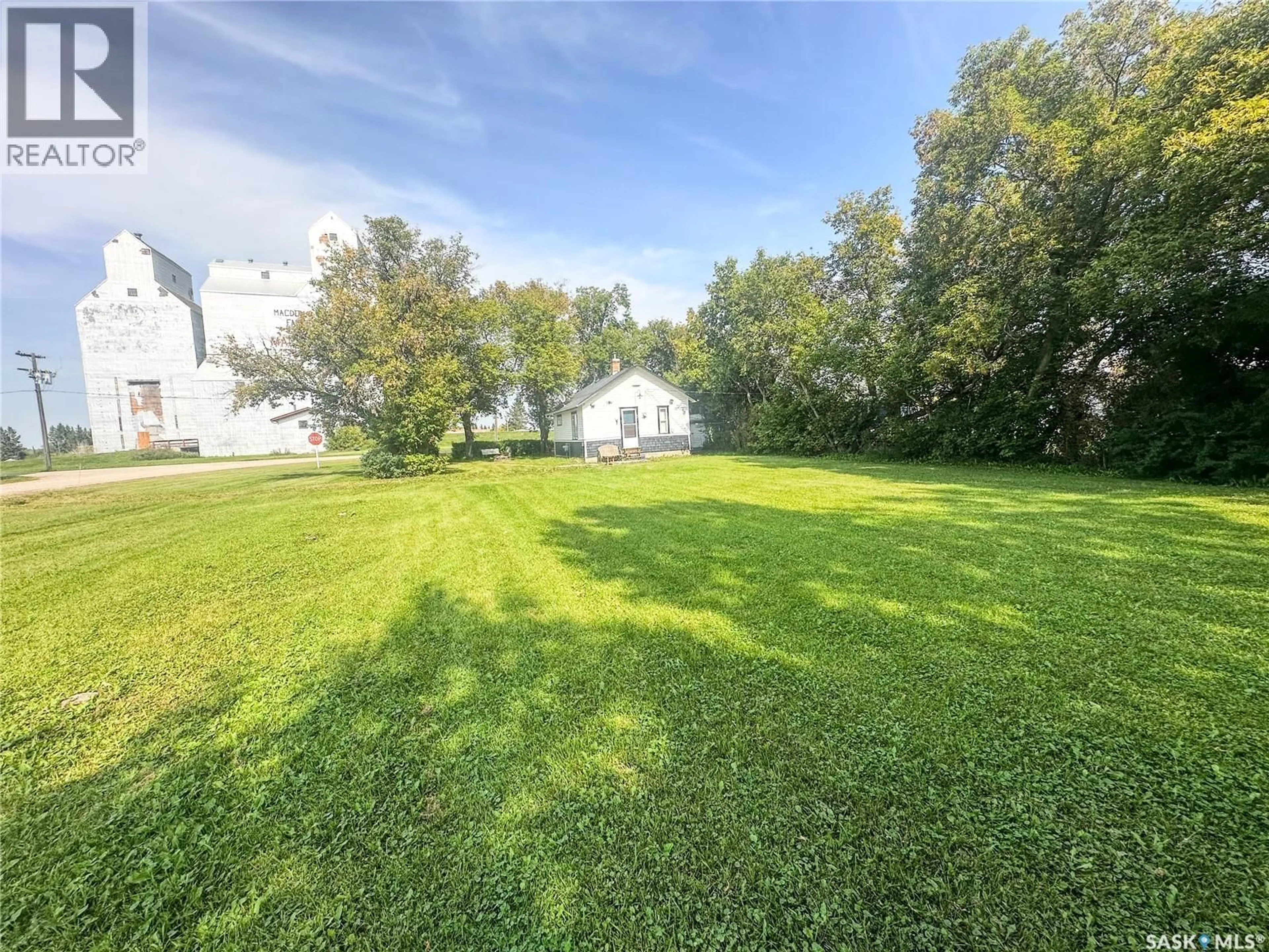 A pic from outside/outdoor area/front of a property/back of a property/a pic from drone, water/lake/river/ocean view for 1 MAIN STREET, Macnutt Saskatchewan S0A2K0