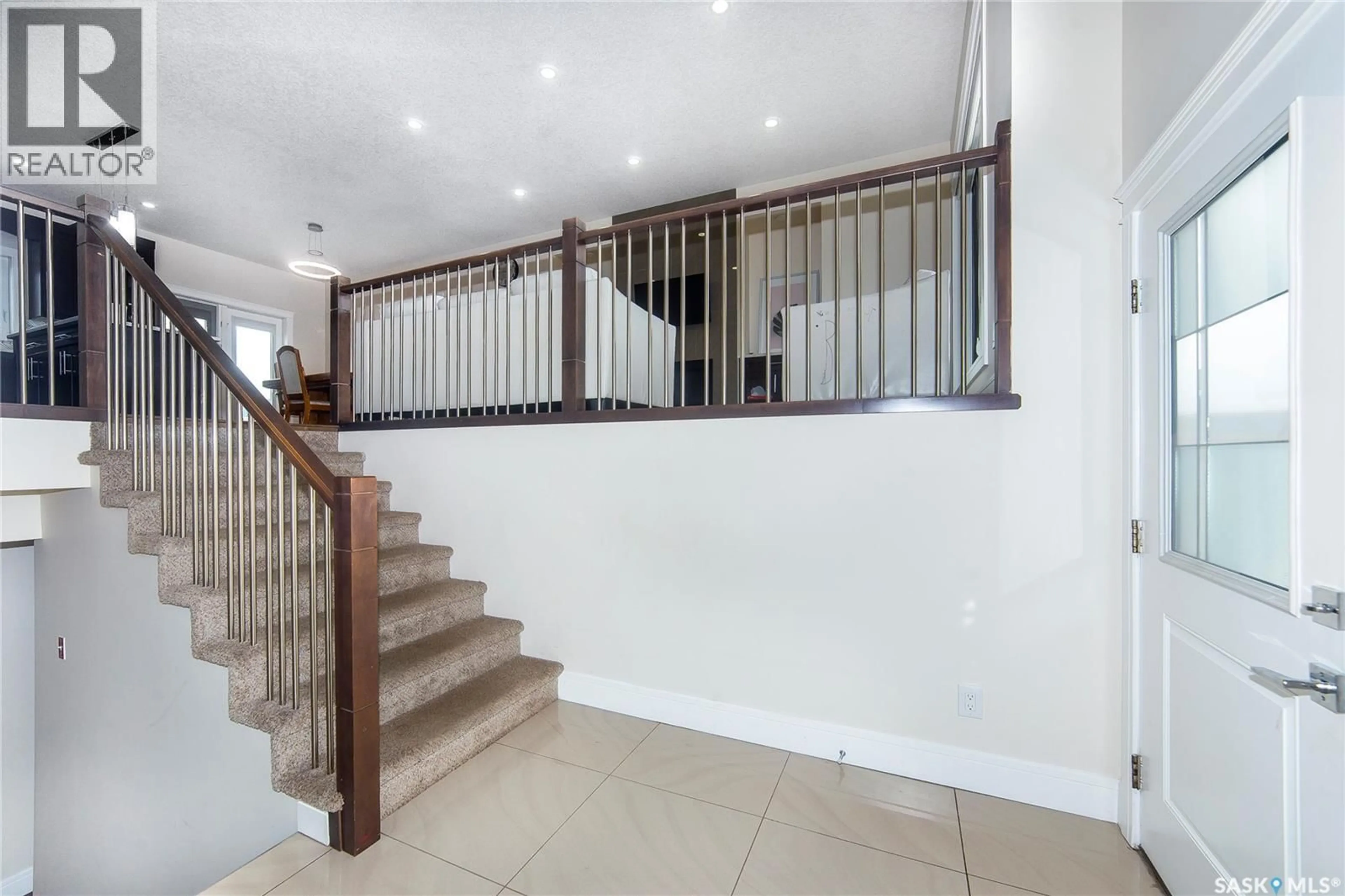 Indoor foyer for 211 SETTLER CRESCENT, Warman Saskatchewan S0K4S2
