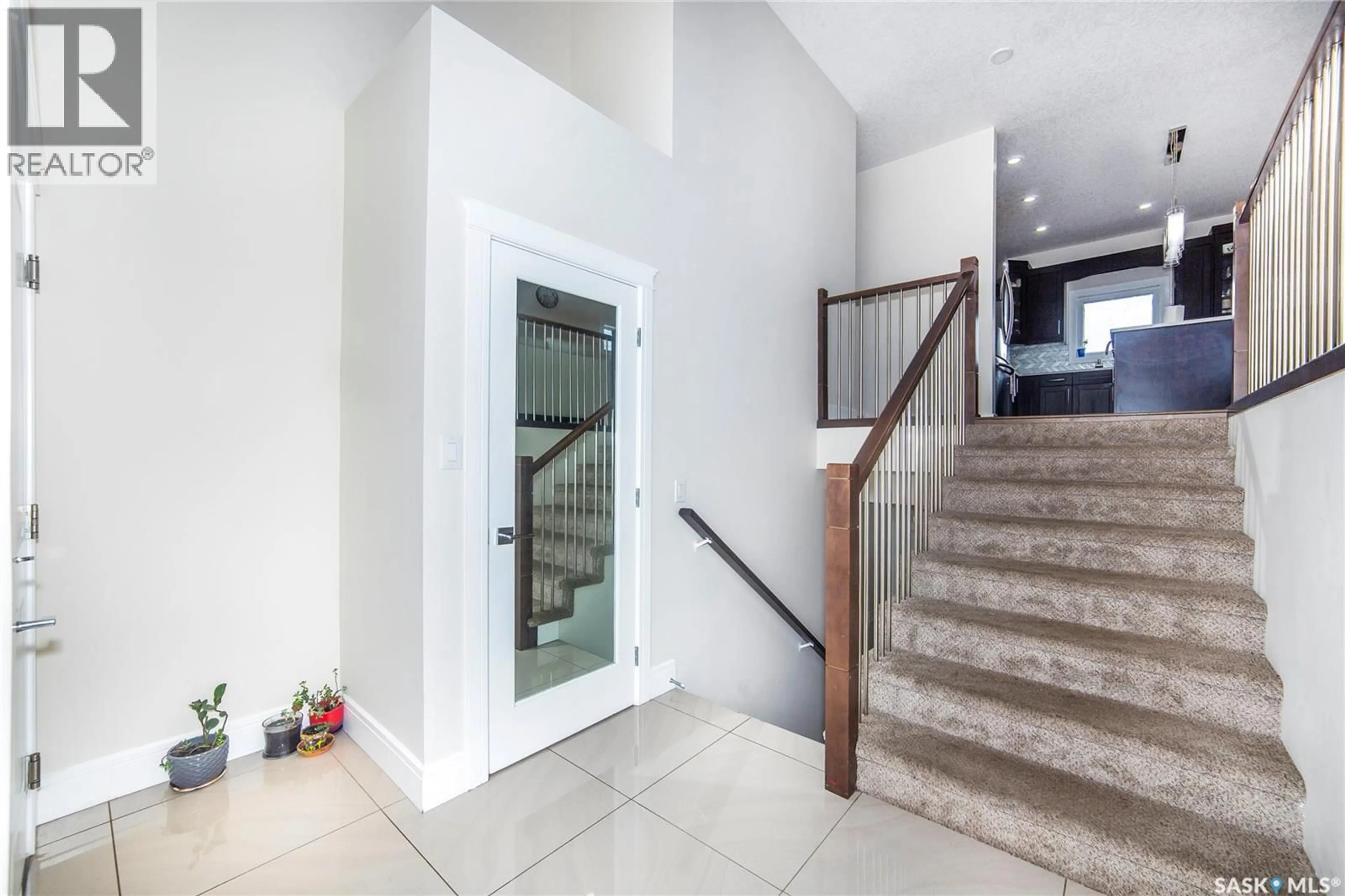 Indoor foyer for 211 SETTLER CRESCENT, Warman Saskatchewan S0K4S2