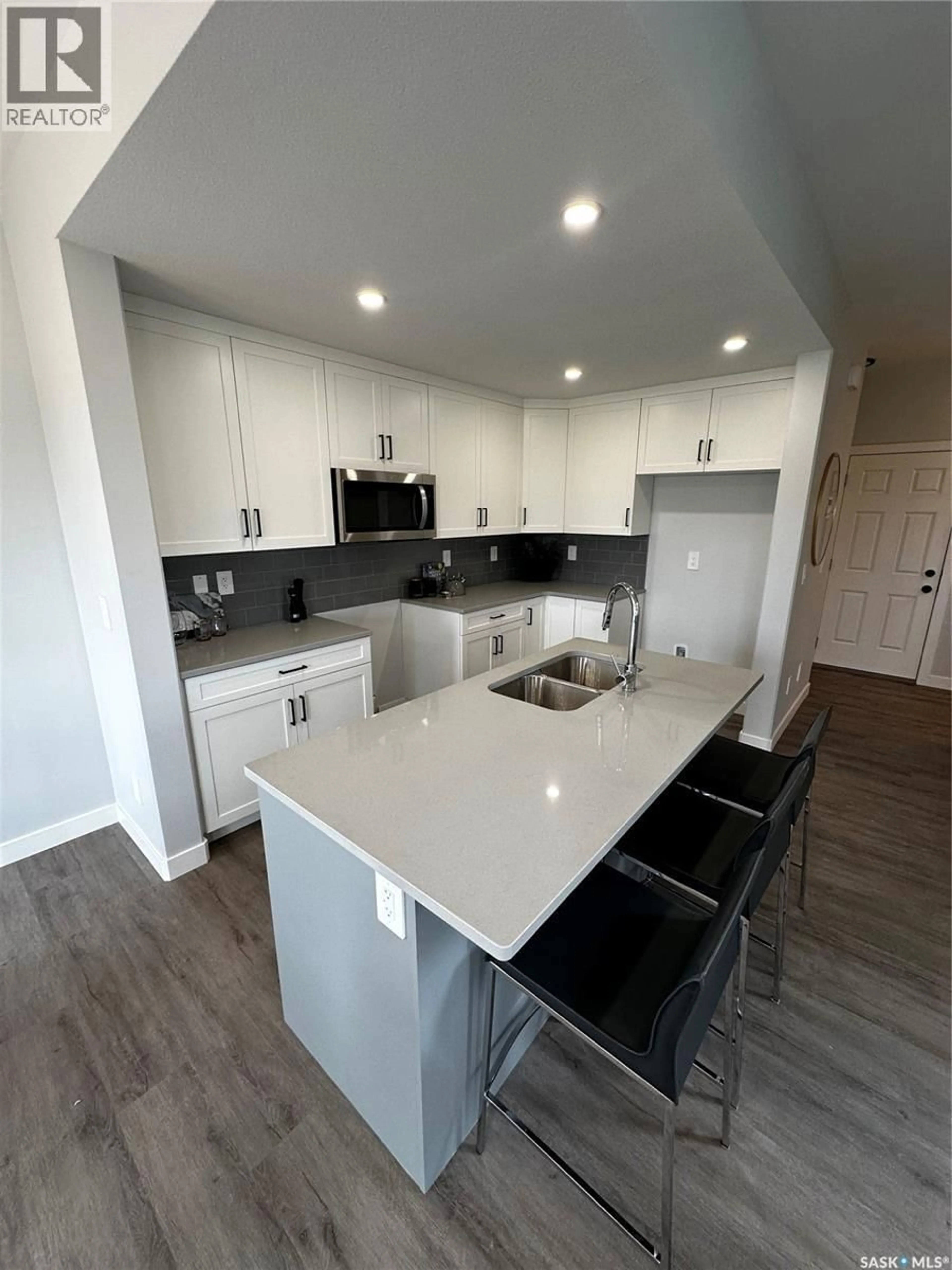 Open concept kitchen, ceramic/tile floor for 504 MYLES HEIDT MANOR, Saskatoon Saskatchewan S7W1H9