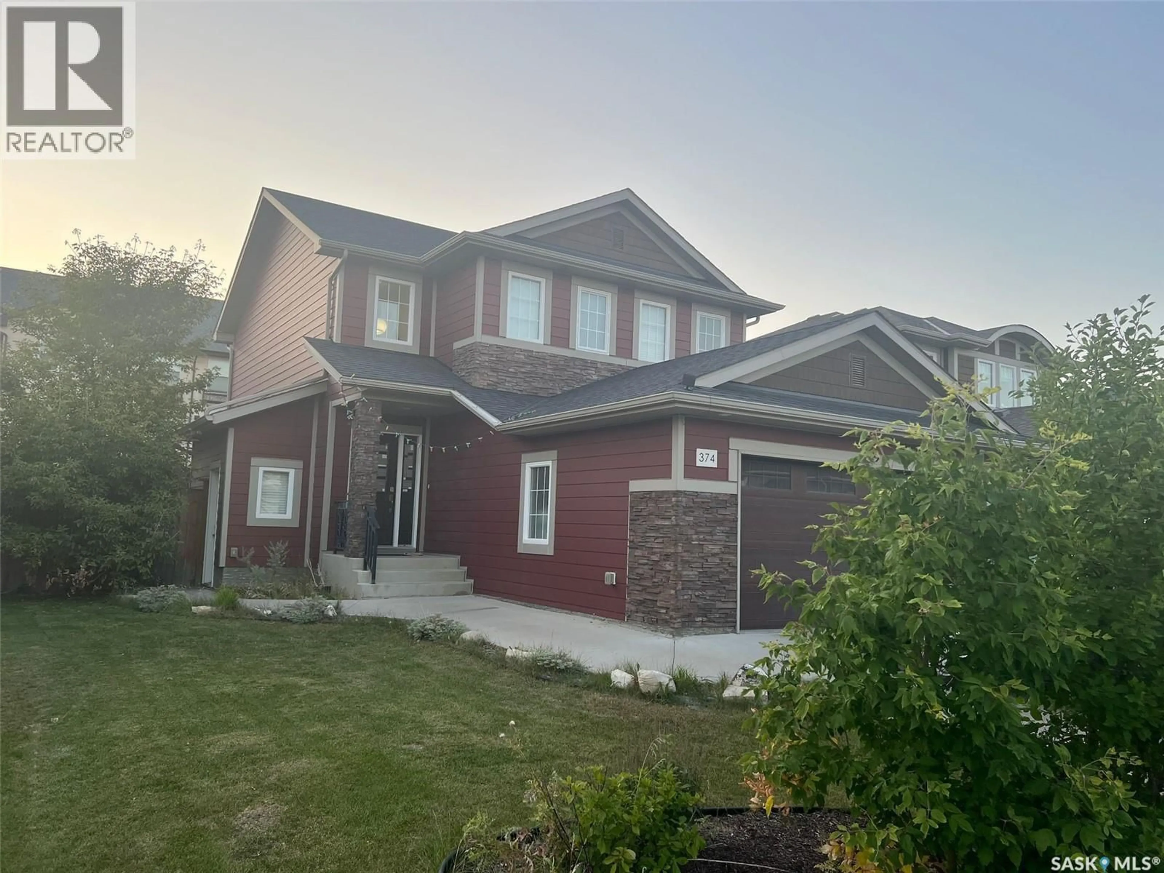 Home with vinyl exterior material, street for 374 PICHLER CRESCENT, Saskatoon Saskatchewan S7V0G3