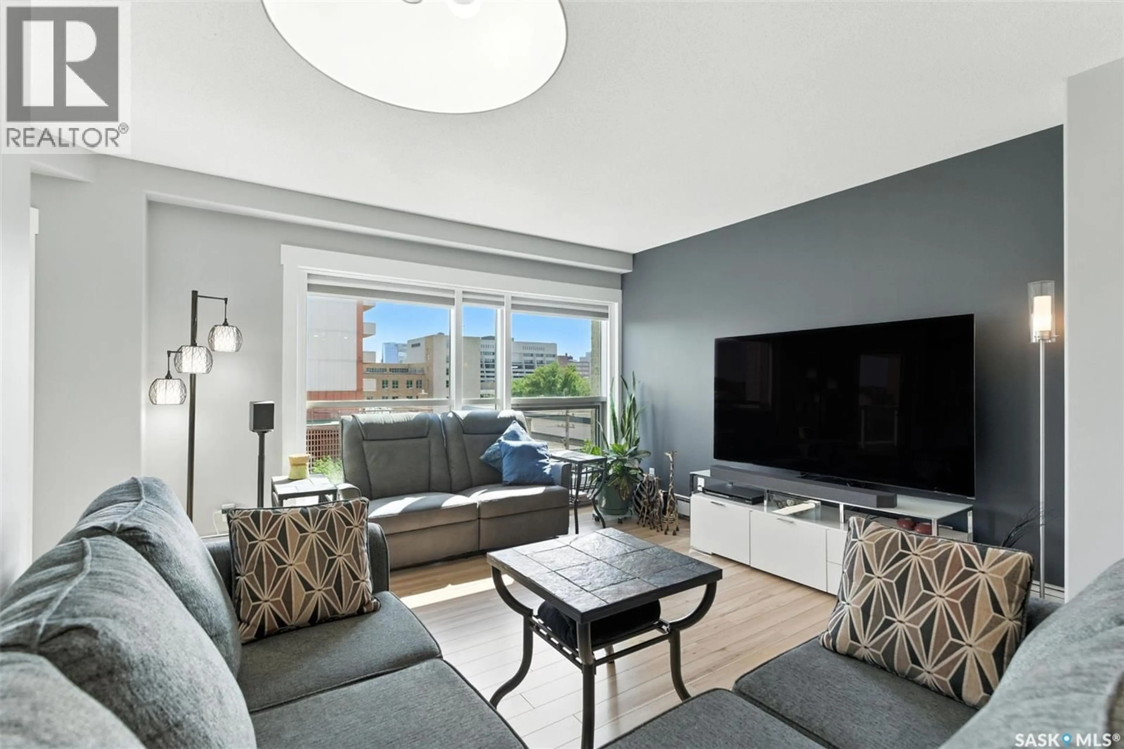Living room with furniture, unknown for 303 - 401 5TH AVENUE N, Saskatoon Saskatchewan S7K2P6