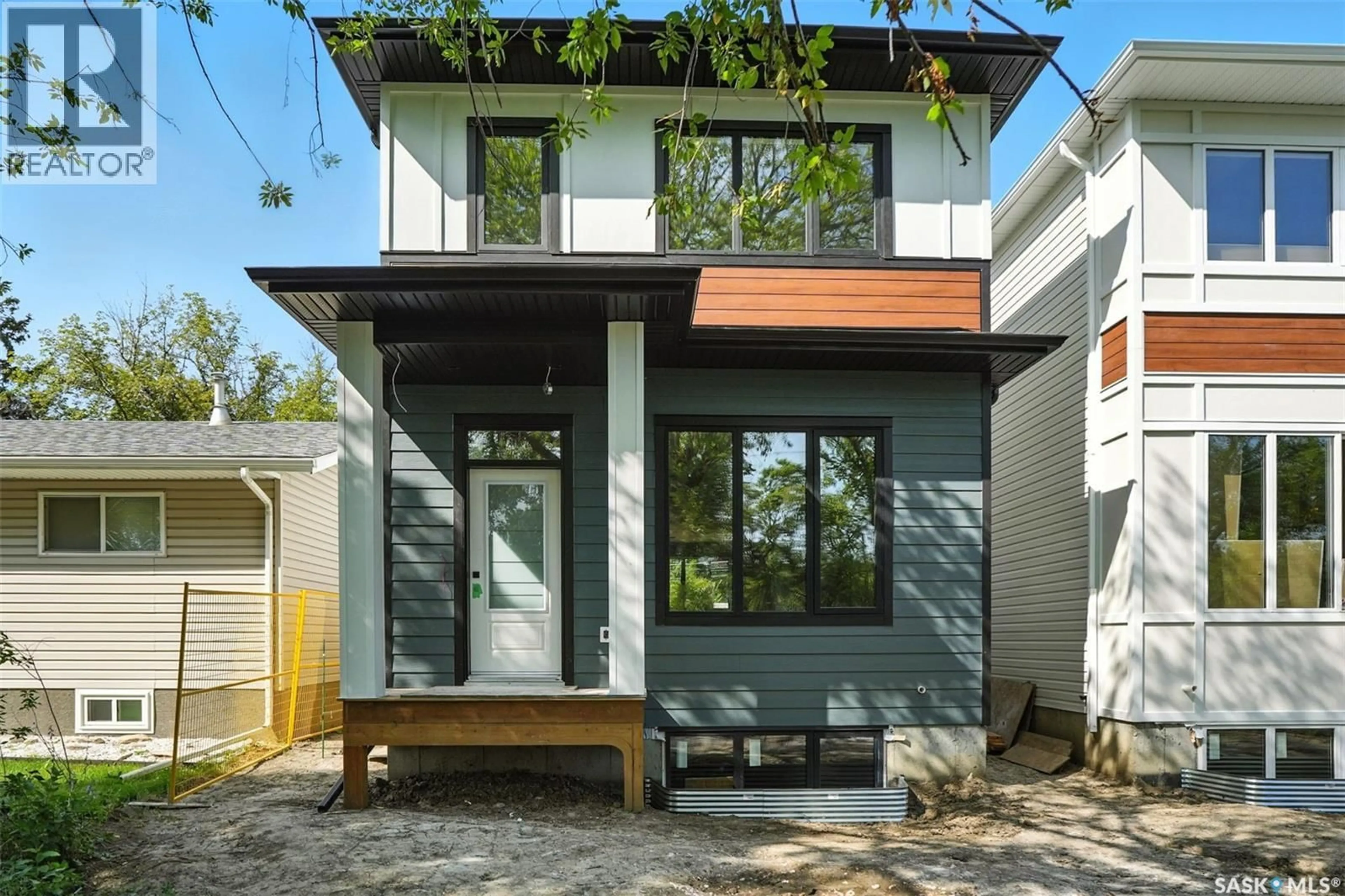 Home with brick exterior material, street for 1914 HERMAN AVENUE, Saskatoon Saskatchewan S7M0M8