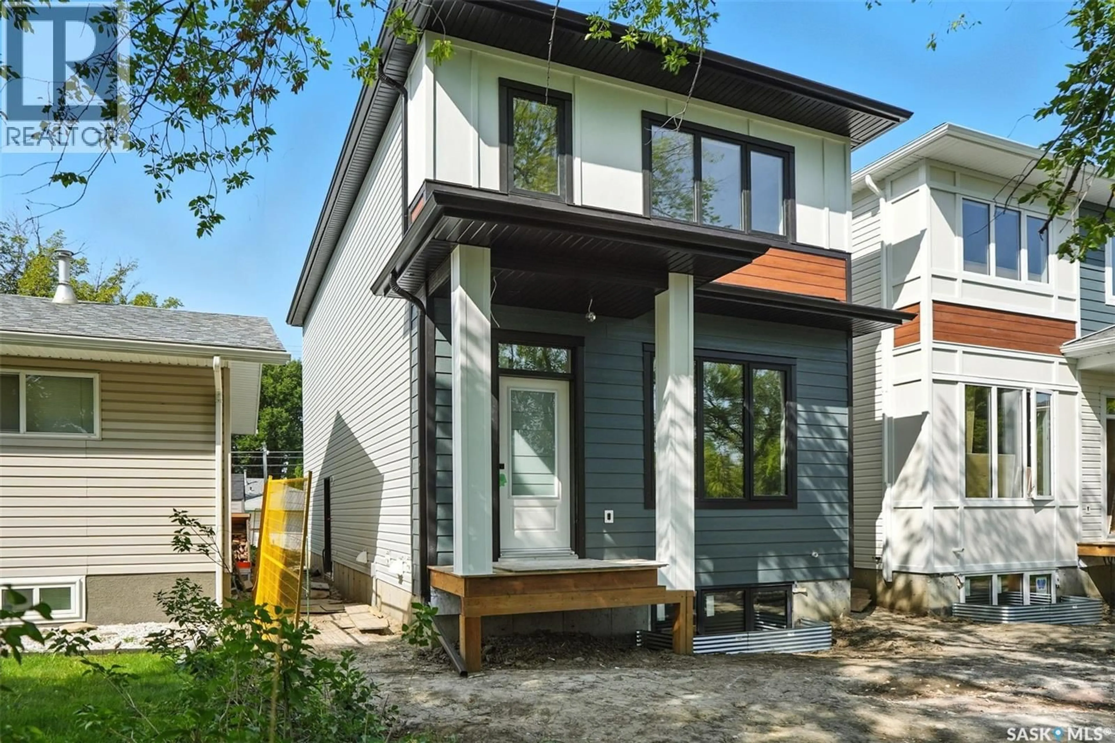 Home with brick exterior material, street for 1914 HERMAN AVENUE, Saskatoon Saskatchewan S7M0M8