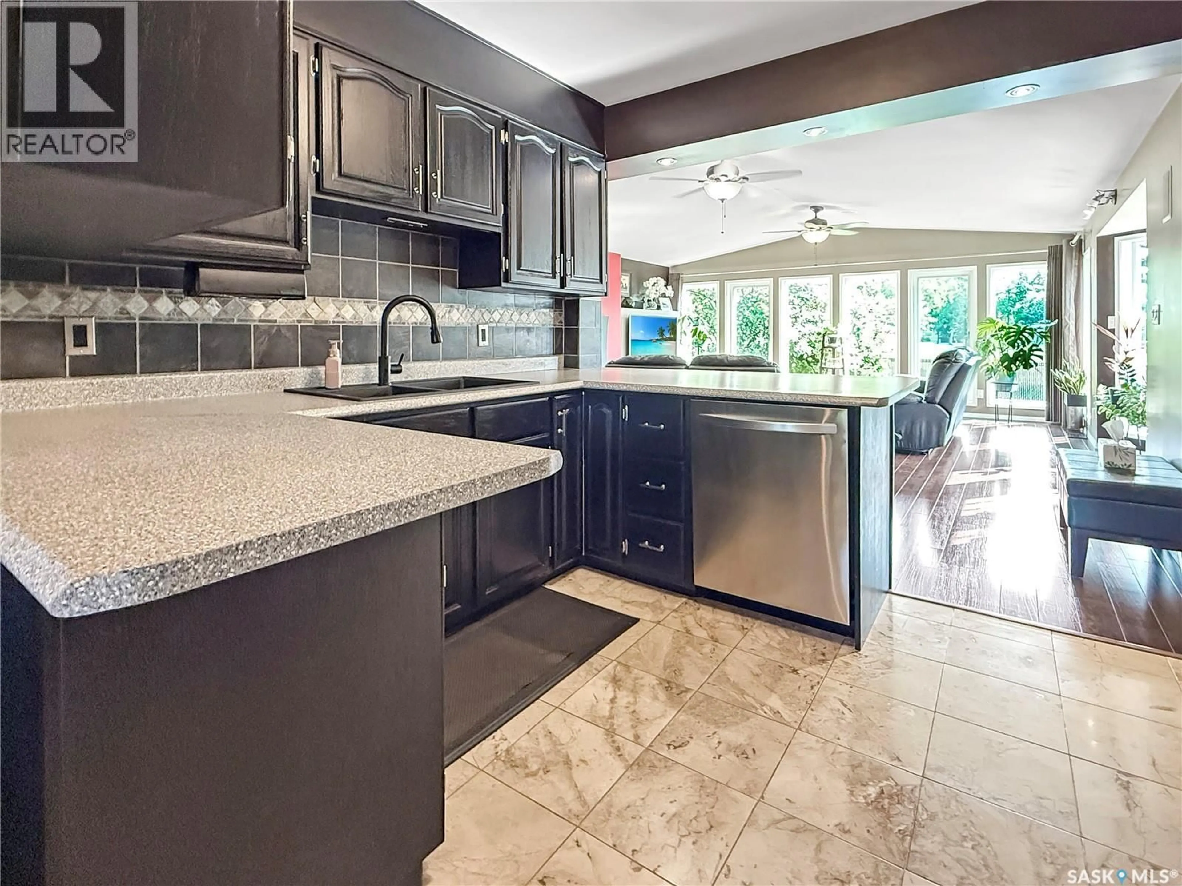 Open concept kitchen, ceramic/tile floor for 3078 6TH AVENUE, Prince Albert Saskatchewan S6V5L8