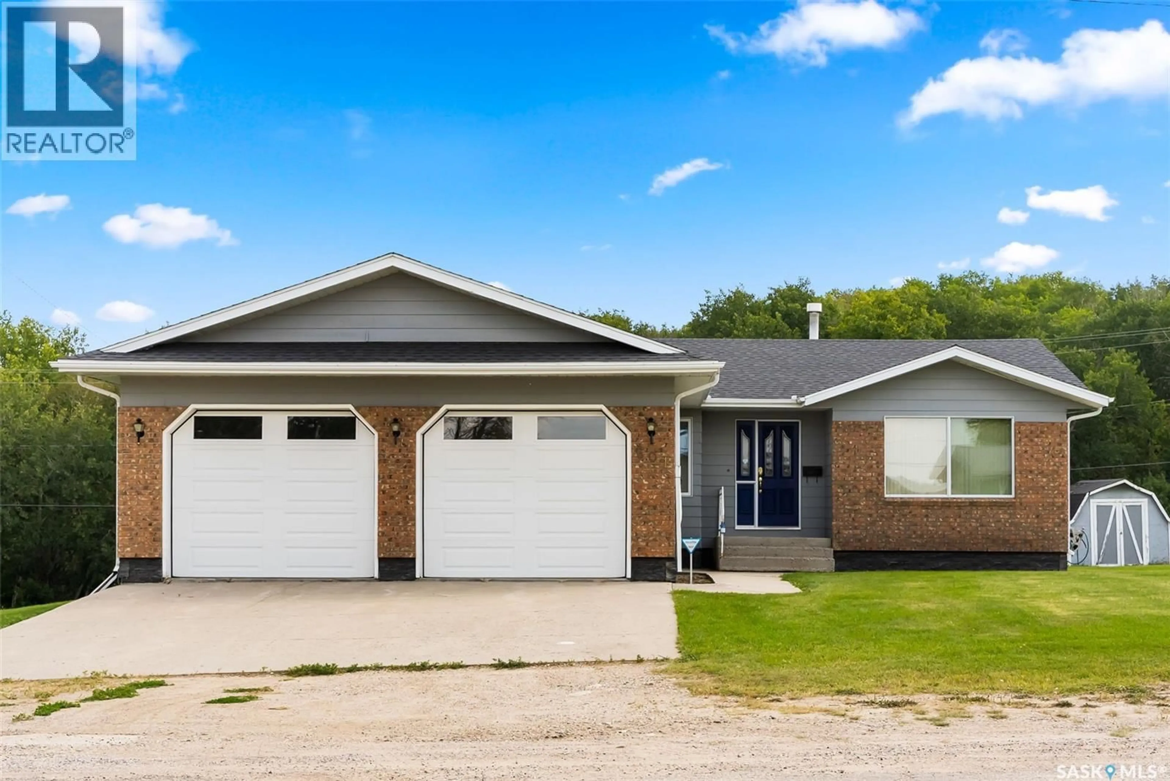 Home with vinyl exterior material, street for 601 MAIN STREET, Punnichy Saskatchewan S0A0C1