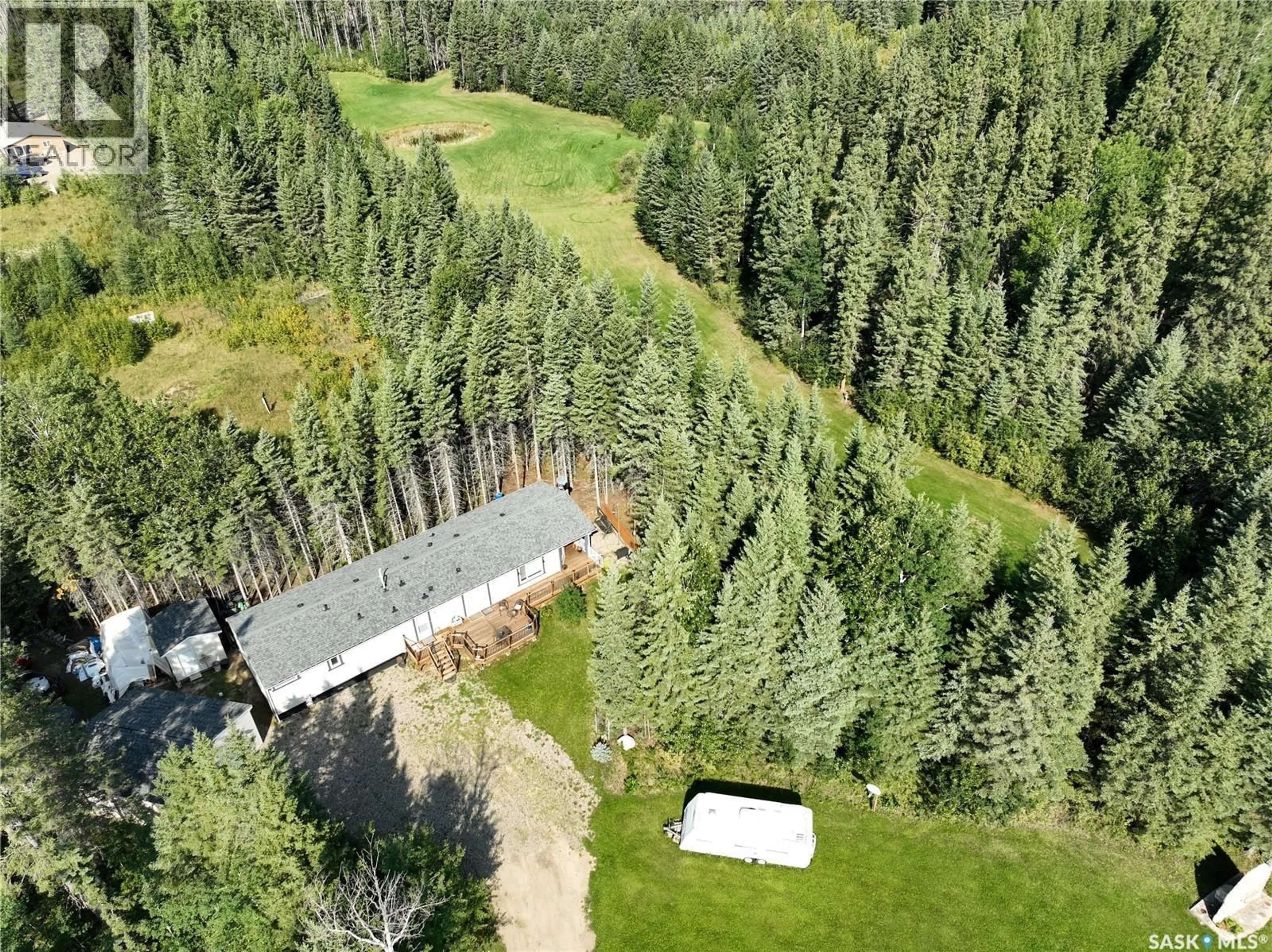 A pic from outside/outdoor area/front of a property/back of a property/a pic from drone, forest/trees view for 43 CRANBERRY CREEK CRESCENT, Candle Lake Saskatchewan S0J3E0