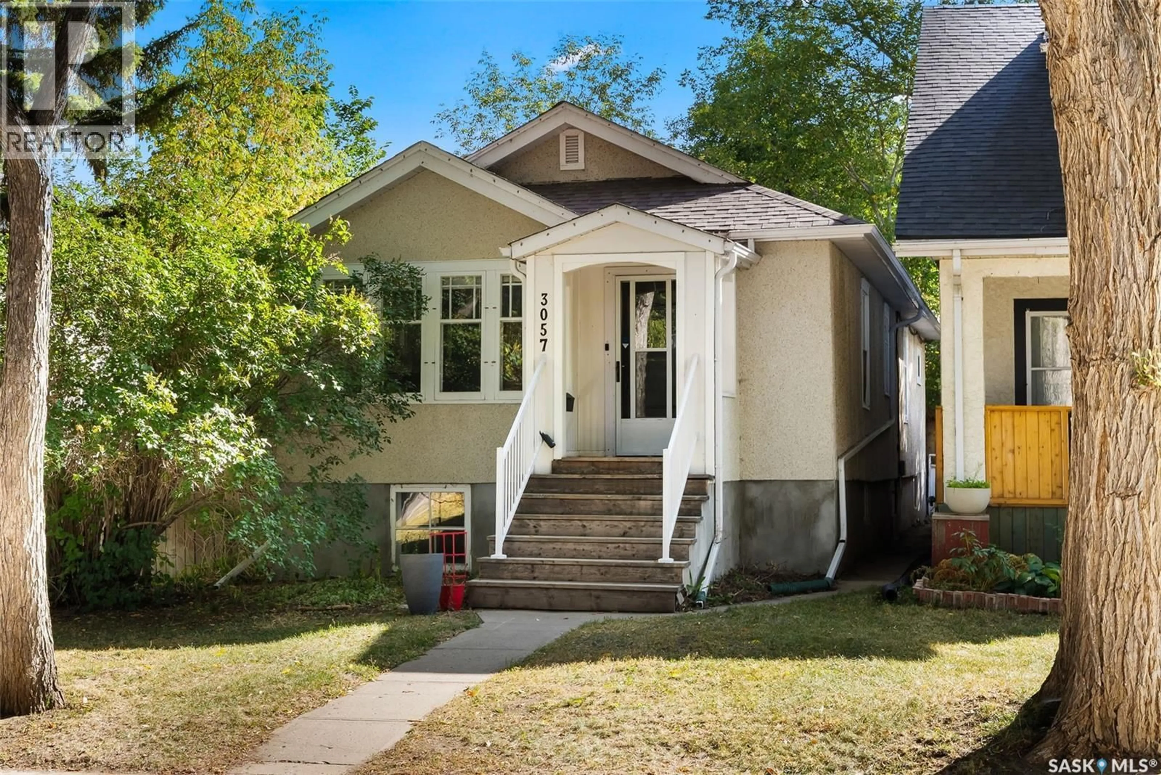 Home with vinyl exterior material, street for 3057 RETALLACK STREET, Regina Saskatchewan S4S1T3