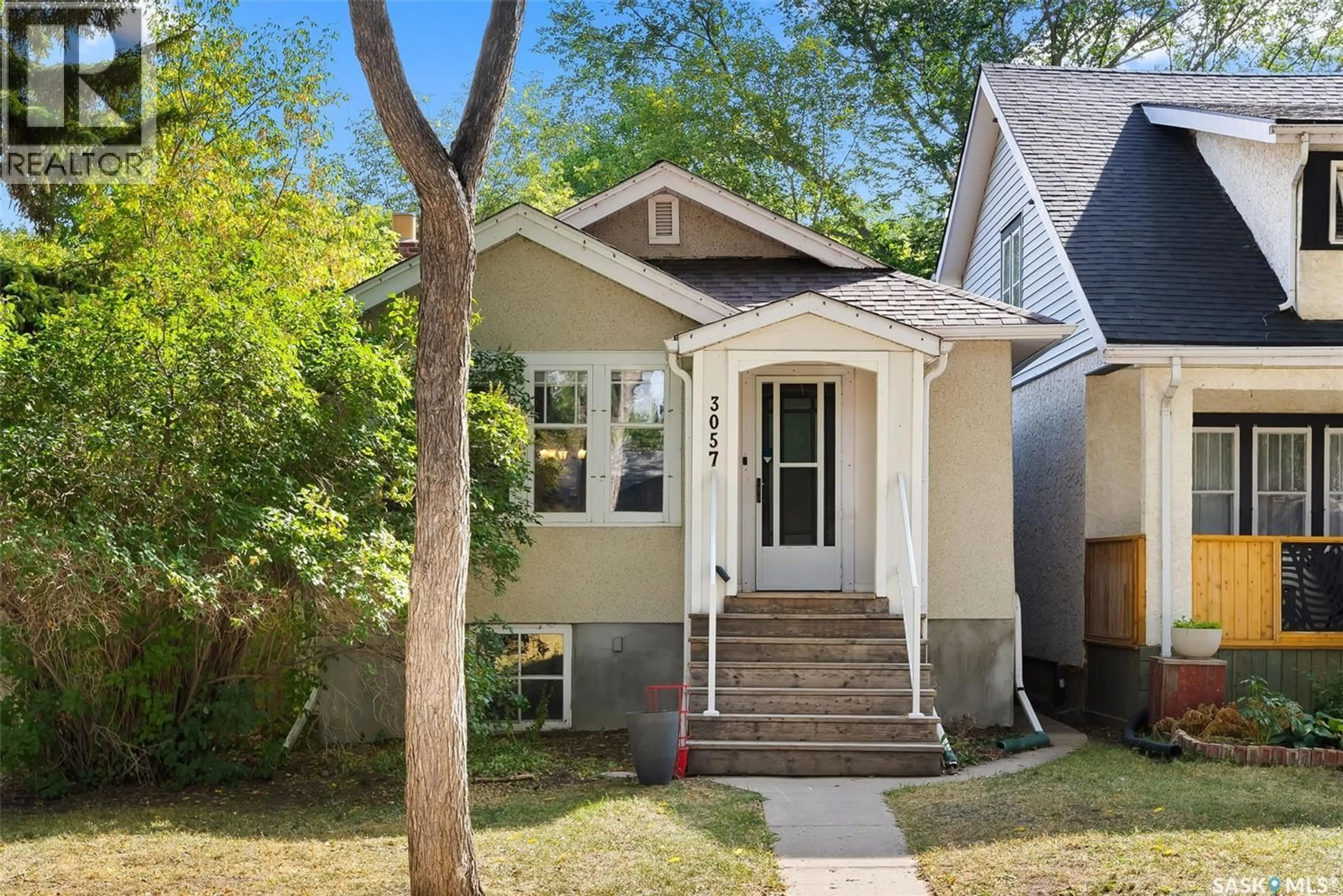 Home with vinyl exterior material, street for 3057 RETALLACK STREET, Regina Saskatchewan S4S1T3