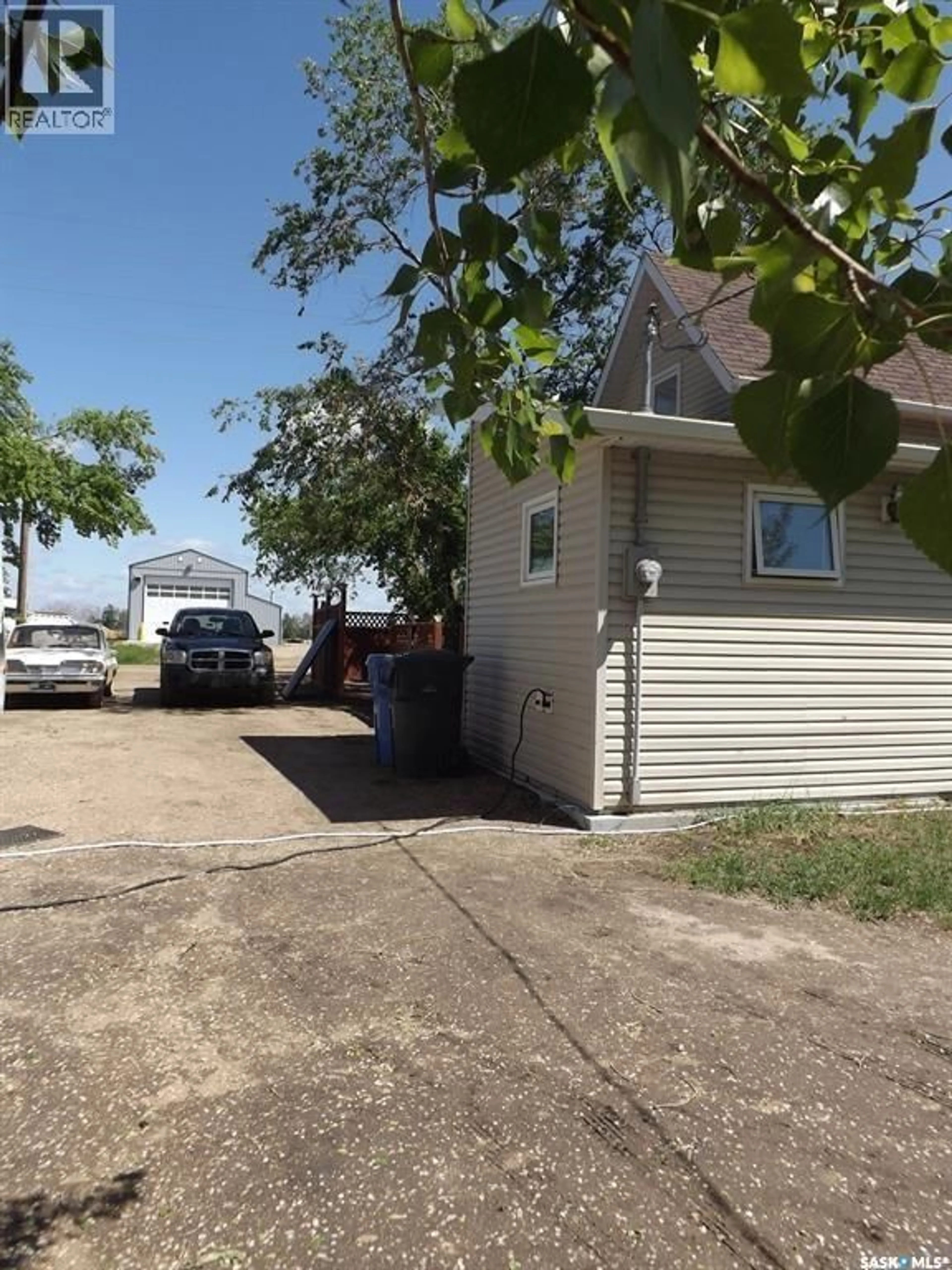A pic from outside/outdoor area/front of a property/back of a property/a pic from drone, street for 713 BEHARREL STREET, Oxbow Saskatchewan S0C2B0