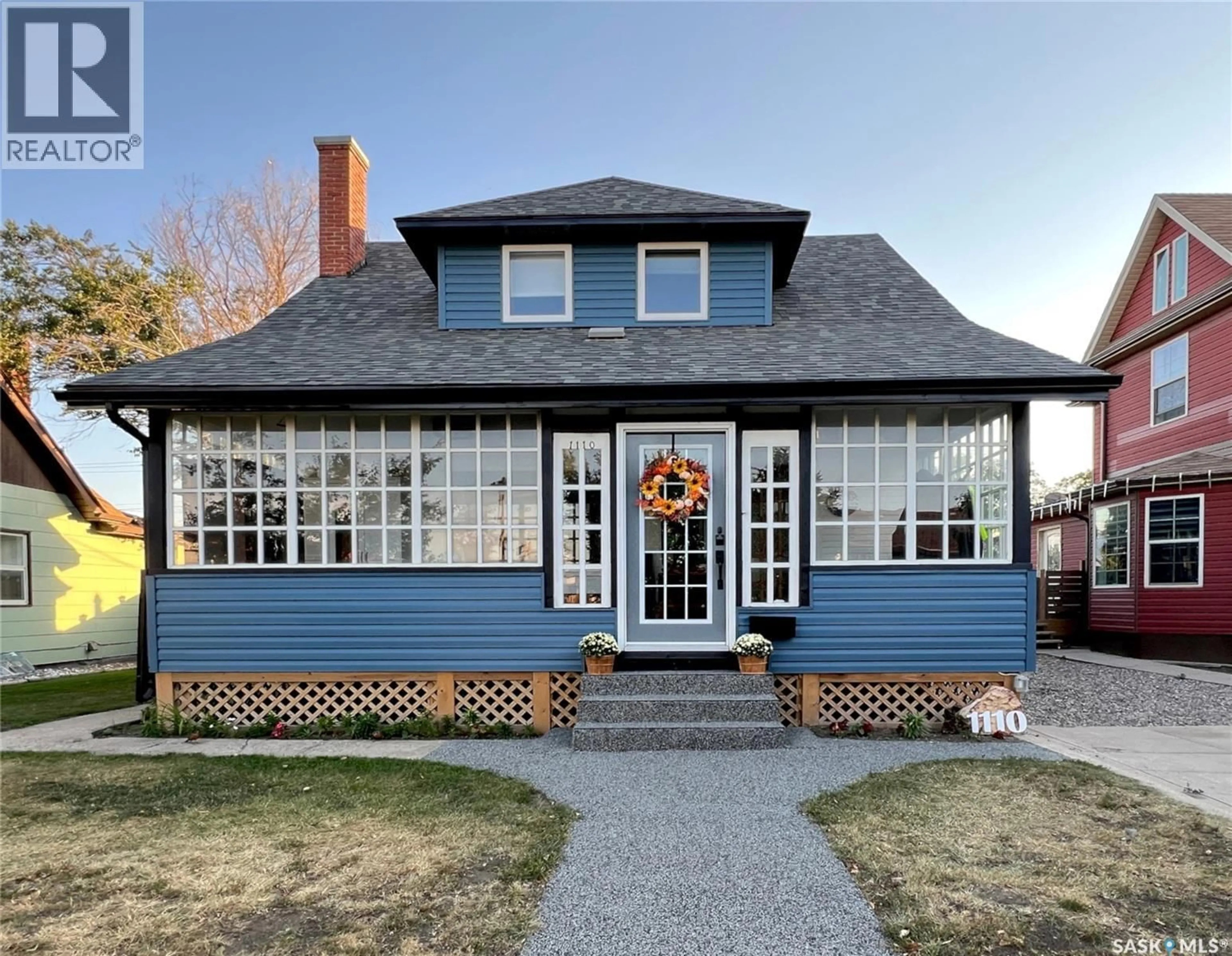 Home with brick exterior material, street for 1110 3RD STREET, Estevan Saskatchewan S4A0R7
