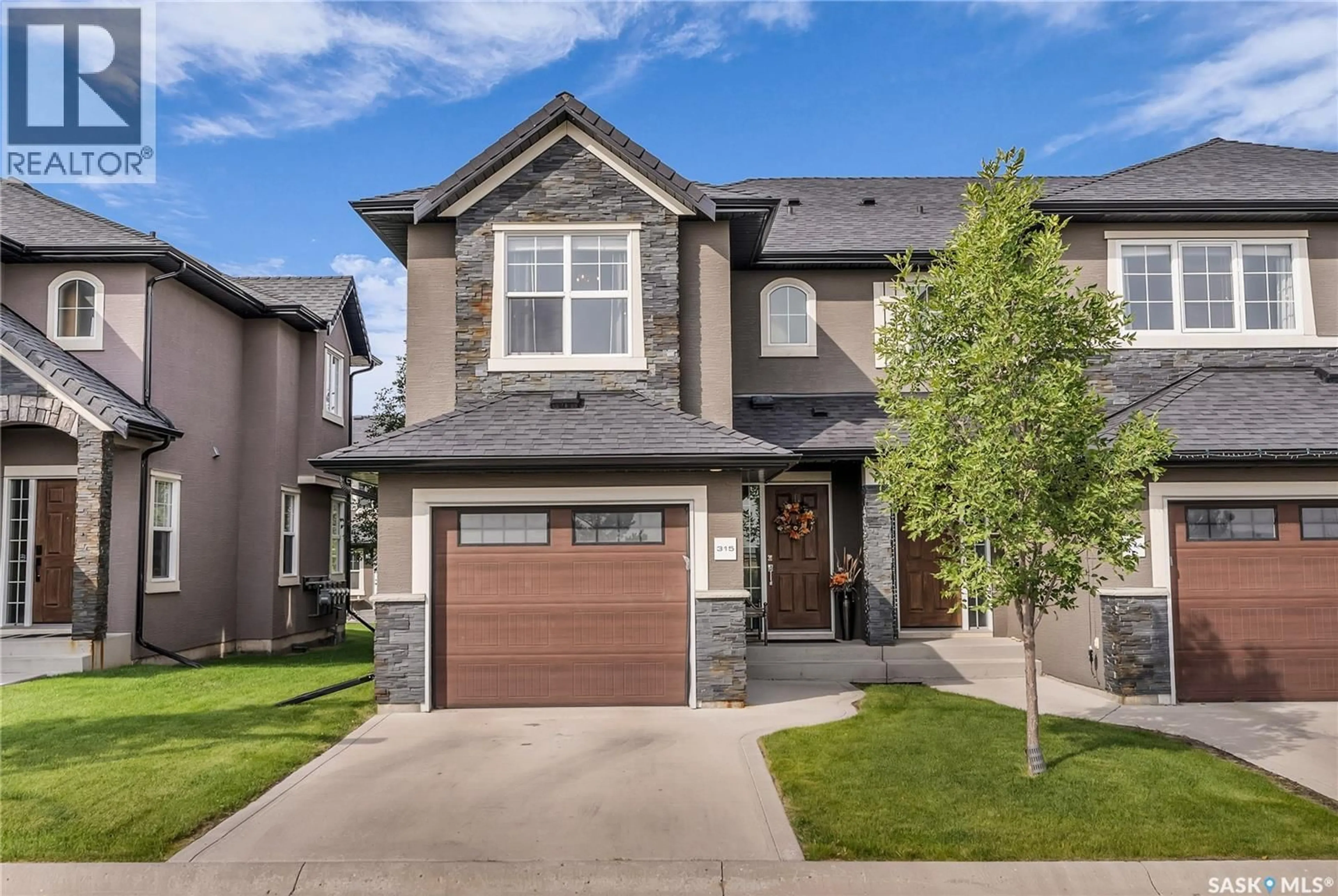 Home with brick exterior material, street for 315 - 1303 PATON CRESCENT, Saskatoon Saskatchewan S7W0P6