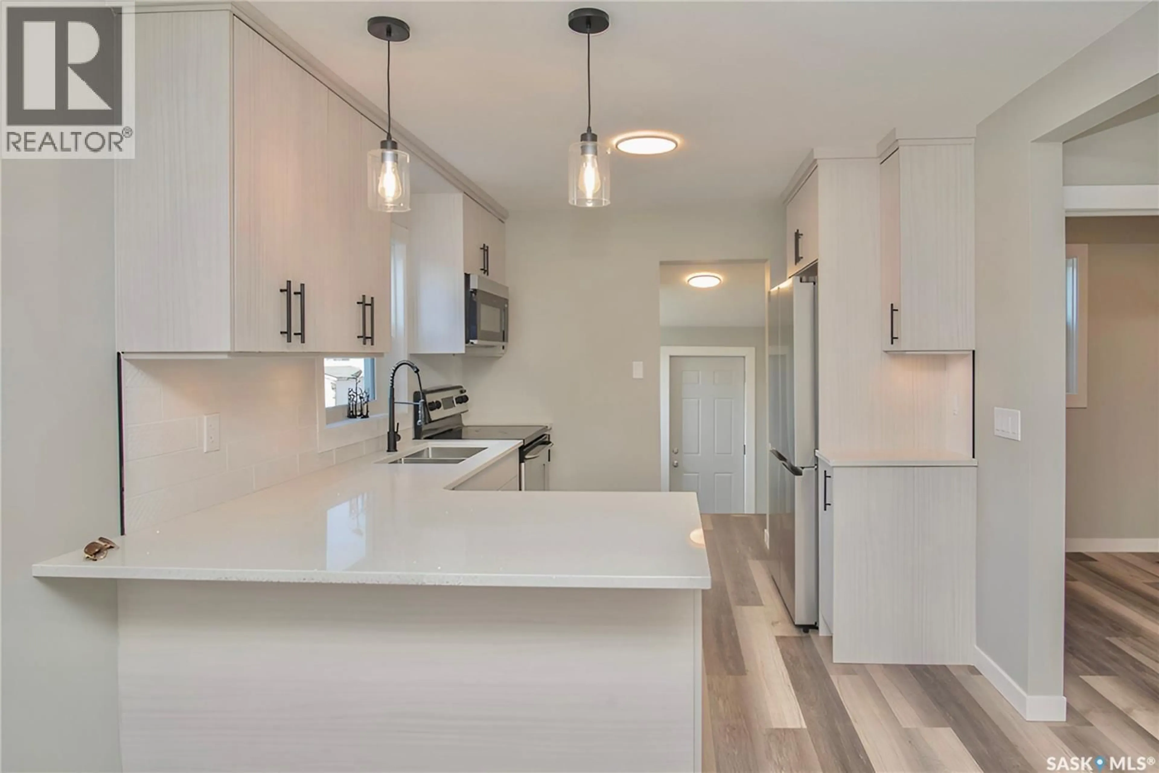 Open concept kitchen, unknown for 212 ANGUS STREET, Regina Saskatchewan S4R3K4