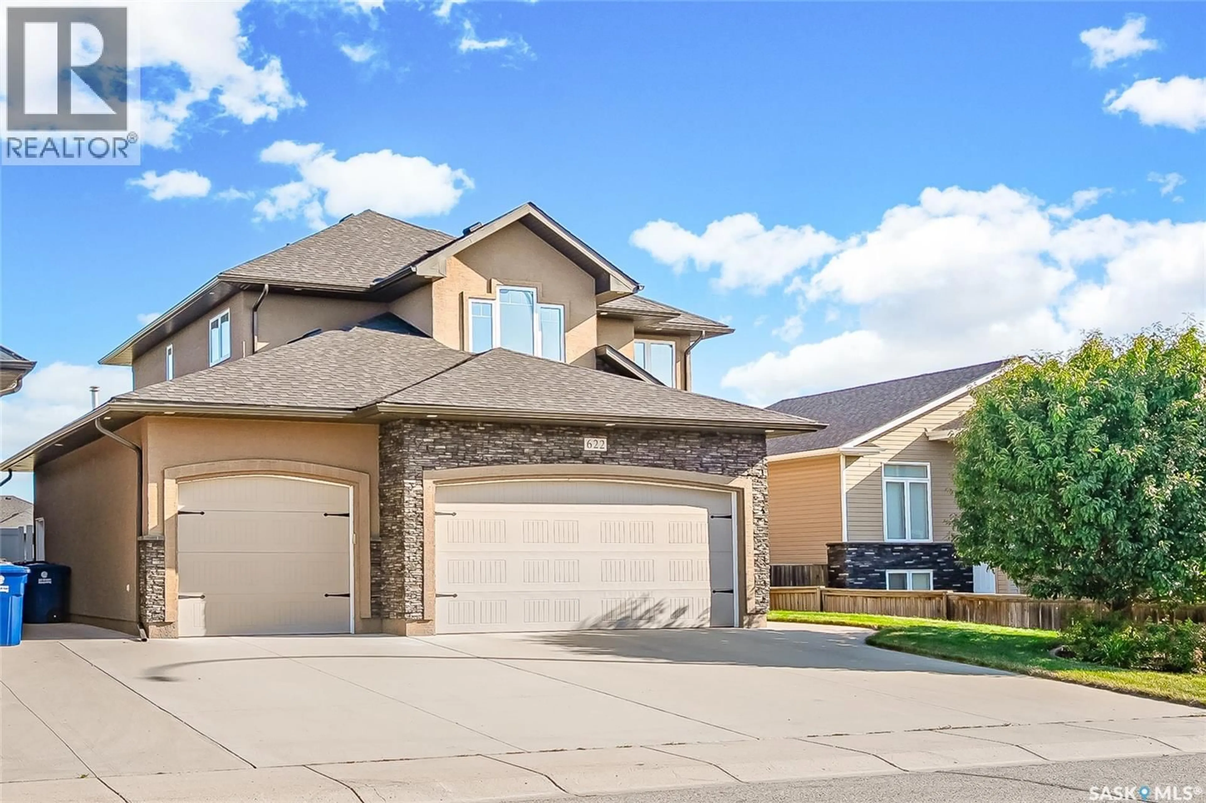 Home with vinyl exterior material, street for 622 THIESSEN STREET, Warman Saskatchewan S0K4S2