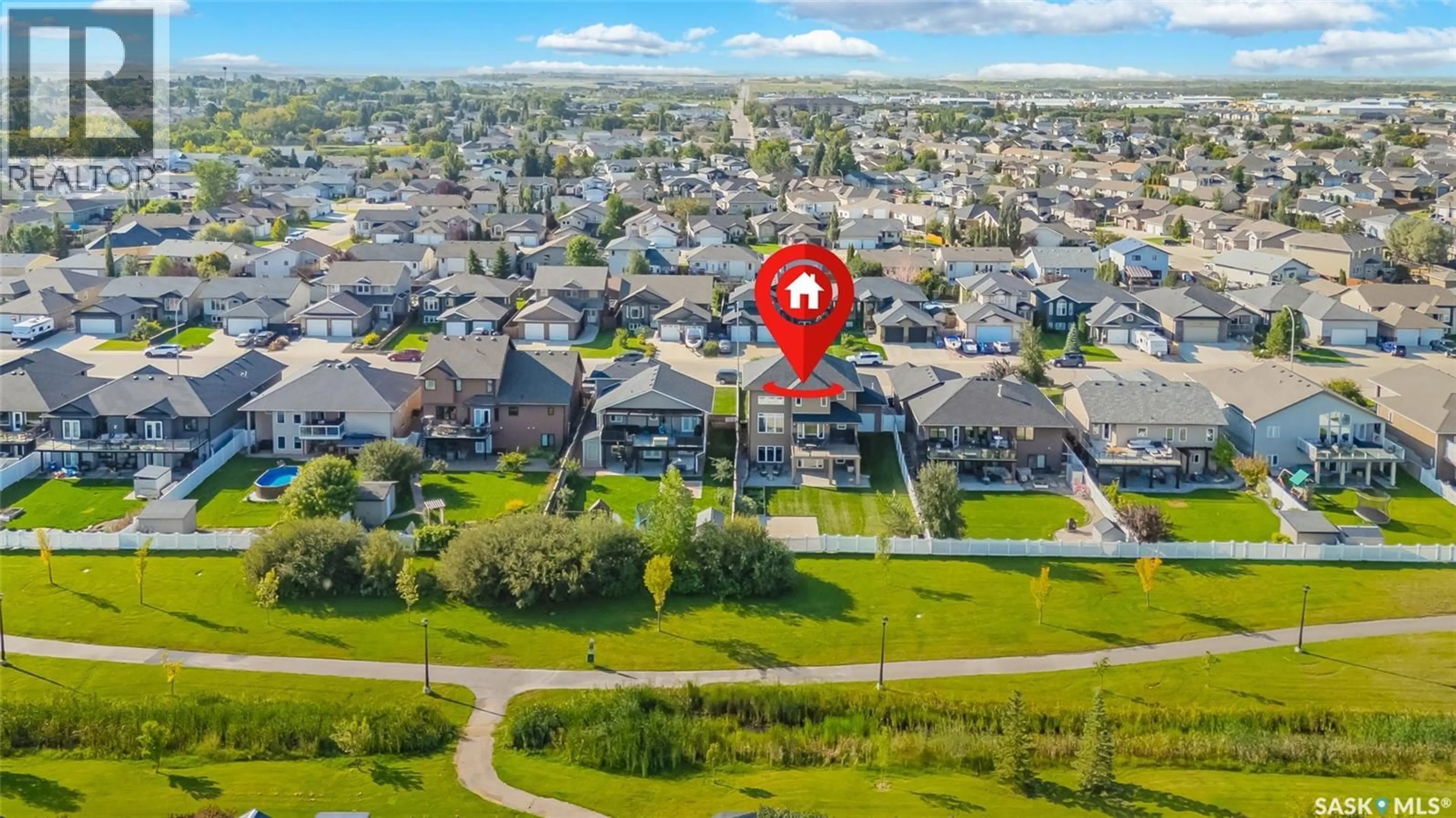 A pic from outside/outdoor area/front of a property/back of a property/a pic from drone, street for 622 THIESSEN STREET, Warman Saskatchewan S0K4S2