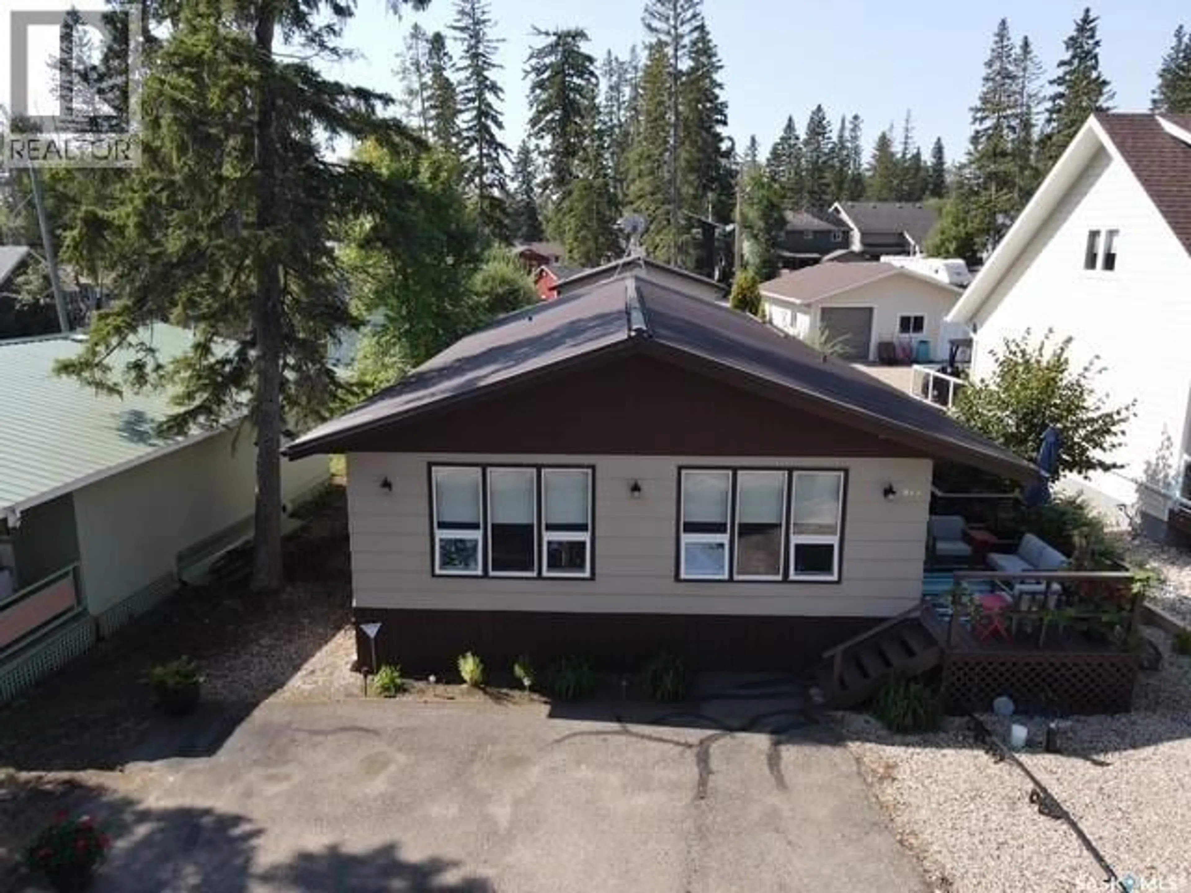 A pic from outside/outdoor area/front of a property/back of a property/a pic from drone, unknown for 815 LAKESHORE AVENUE, Duck Mountain Provincial Park Saskatchewan S0A1S0