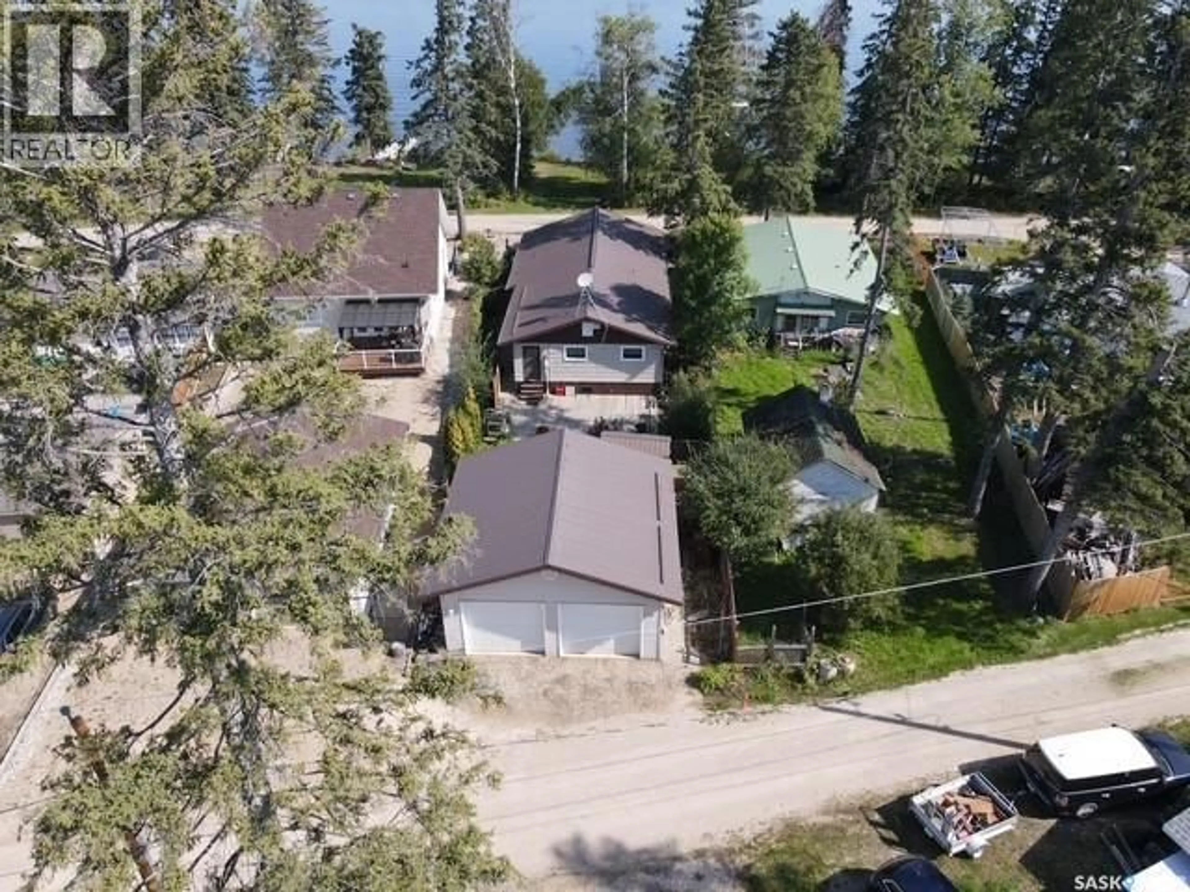 A pic from outside/outdoor area/front of a property/back of a property/a pic from drone, street for 815 LAKESHORE AVENUE, Duck Mountain Provincial Park Saskatchewan S0A1S0