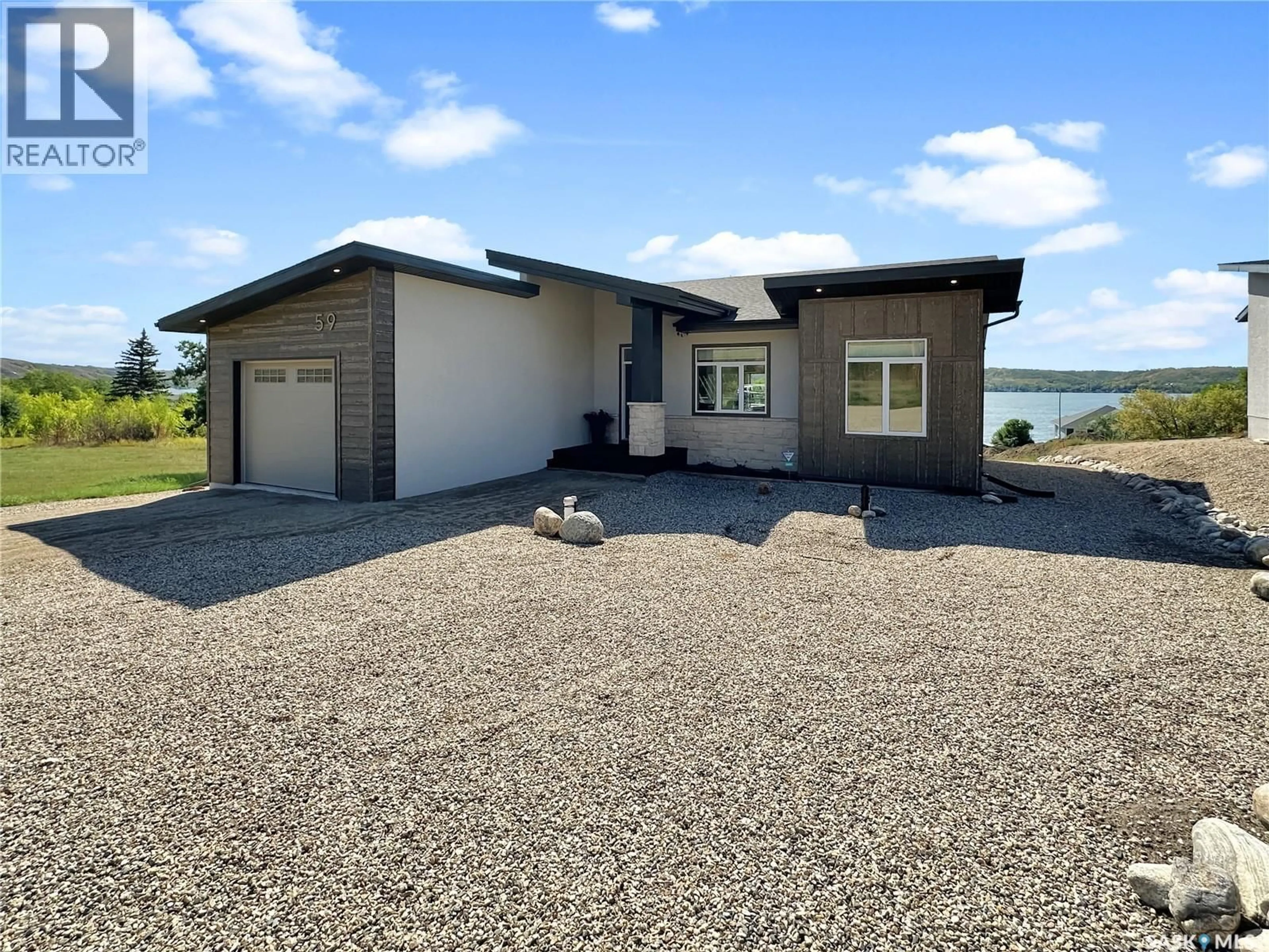 A pic from outside/outdoor area/front of a property/back of a property/a pic from drone, water/lake/river/ocean view for 59 AARON COURT, North Qu'Appelle Rm No. 187 Saskatchewan S0G1S0