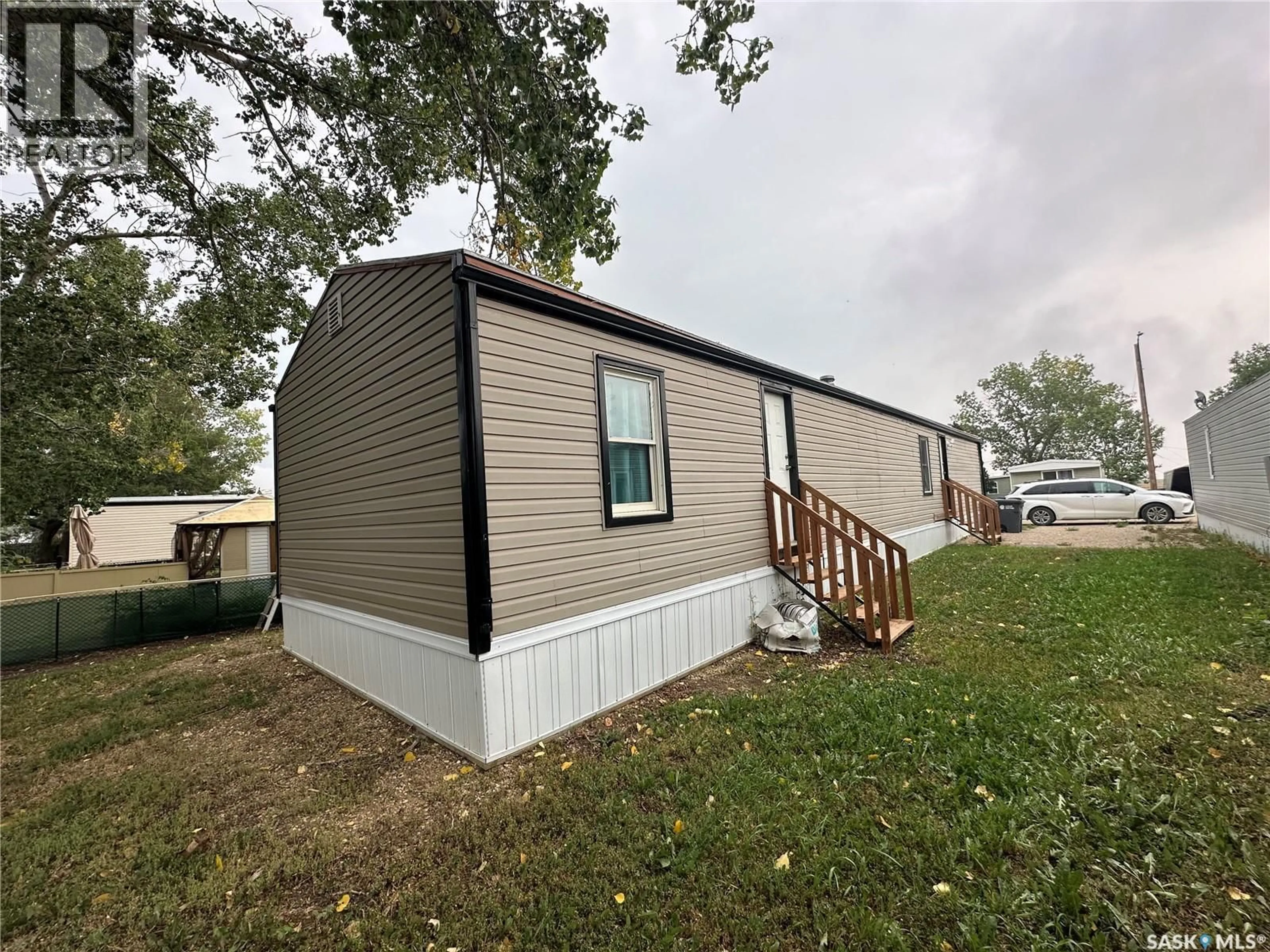 Home with vinyl exterior material, unknown for 52 SUNRISE ESTATES, Assiniboia Saskatchewan S0H0B0