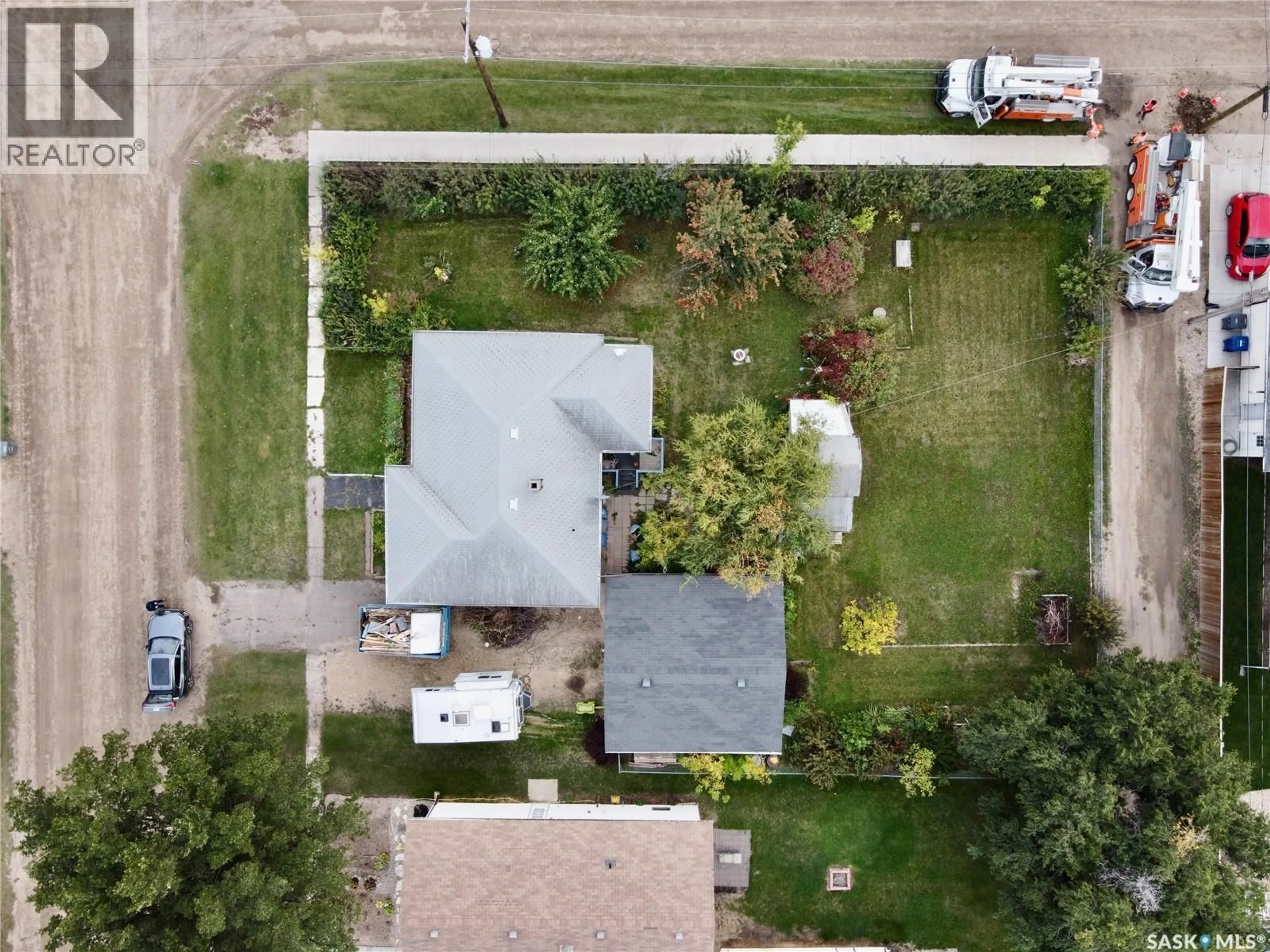 A pic from outside/outdoor area/front of a property/back of a property/a pic from drone, street for 302 4TH AVENUE, Aberdeen Saskatchewan S0K0A0
