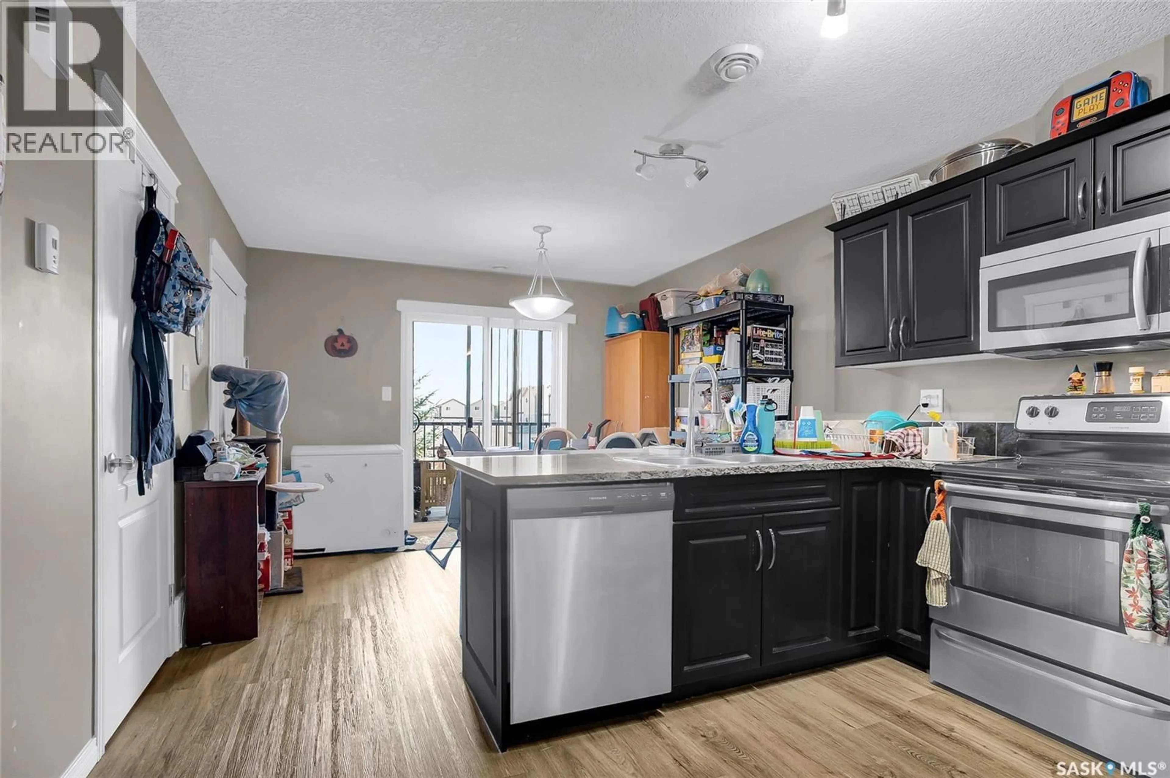 Open concept kitchen, unknown for 103 - 103 KLASSEN CRESCENT, Saskatoon Saskatchewan S7R0J2