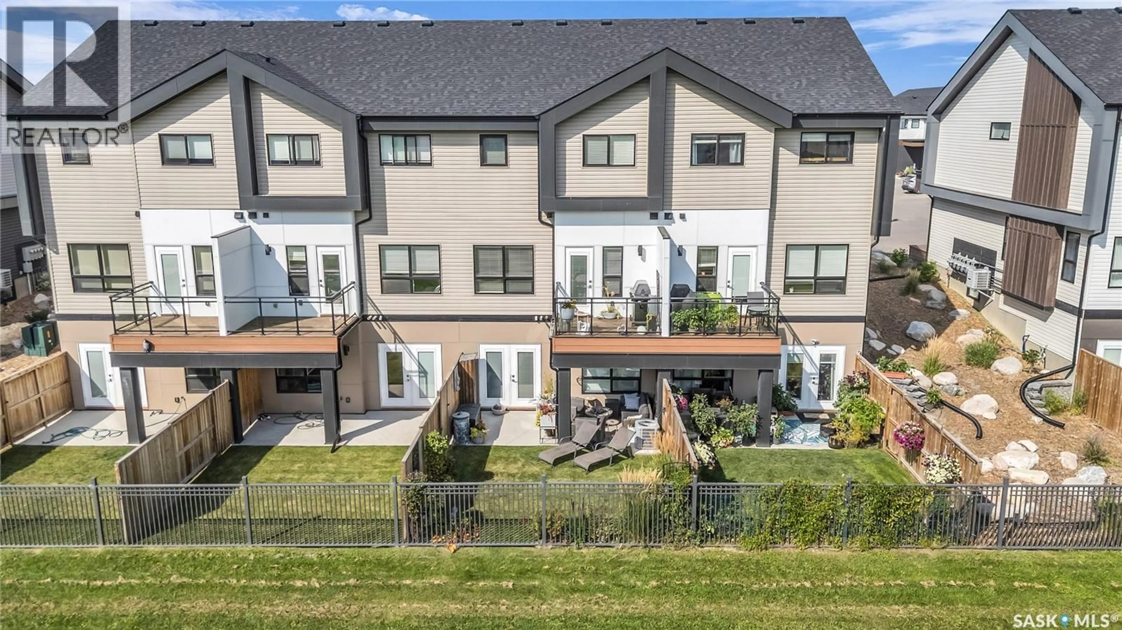 A pic from outside/outdoor area/front of a property/back of a property/a pic from drone, street for 59 619 EVERGREEN BOULEVARD, Saskatoon Saskatchewan S7W0Y7