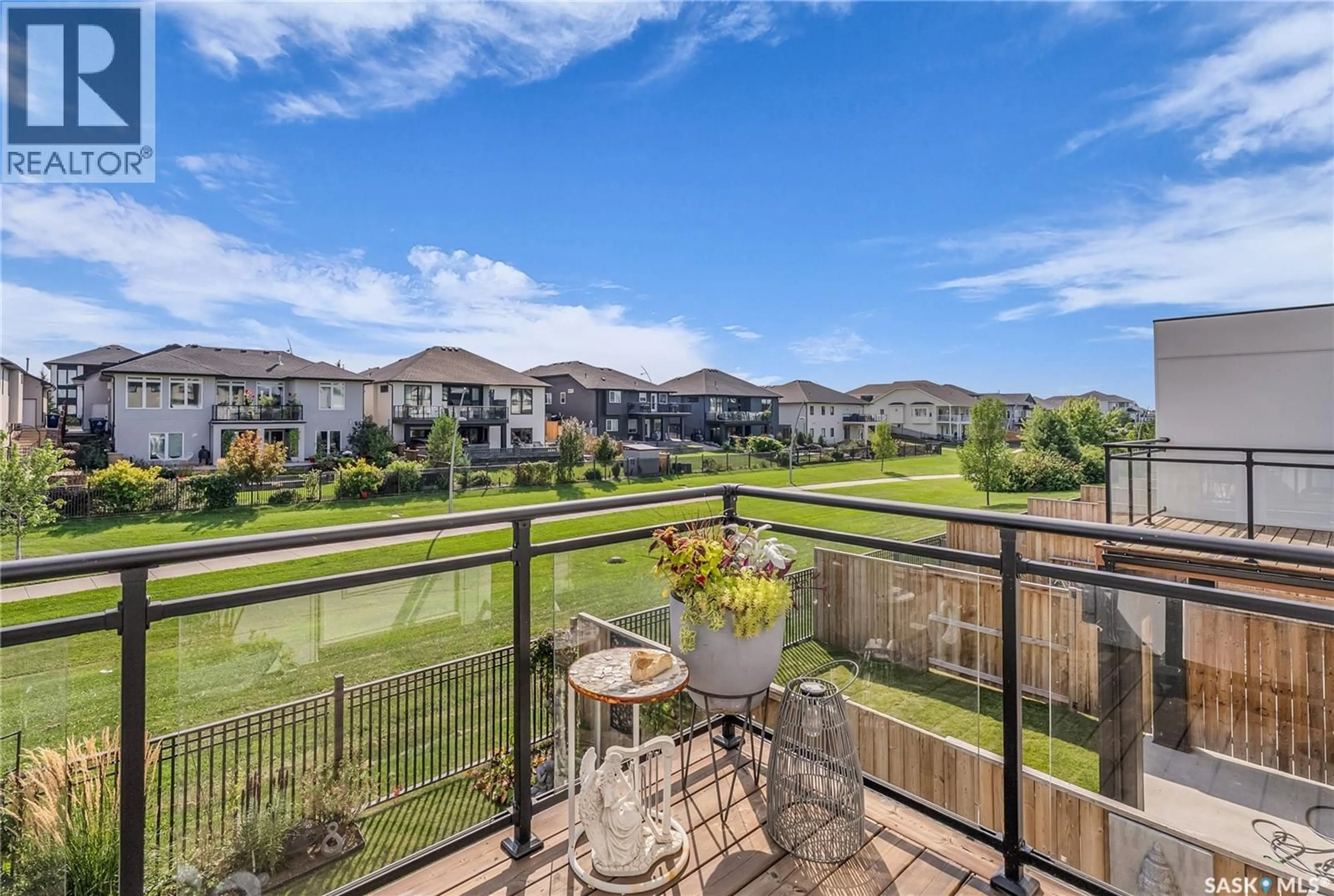 A pic from outside/outdoor area/front of a property/back of a property/a pic from drone, water/lake/river/ocean view for 59 619 EVERGREEN BOULEVARD, Saskatoon Saskatchewan S7W0Y7