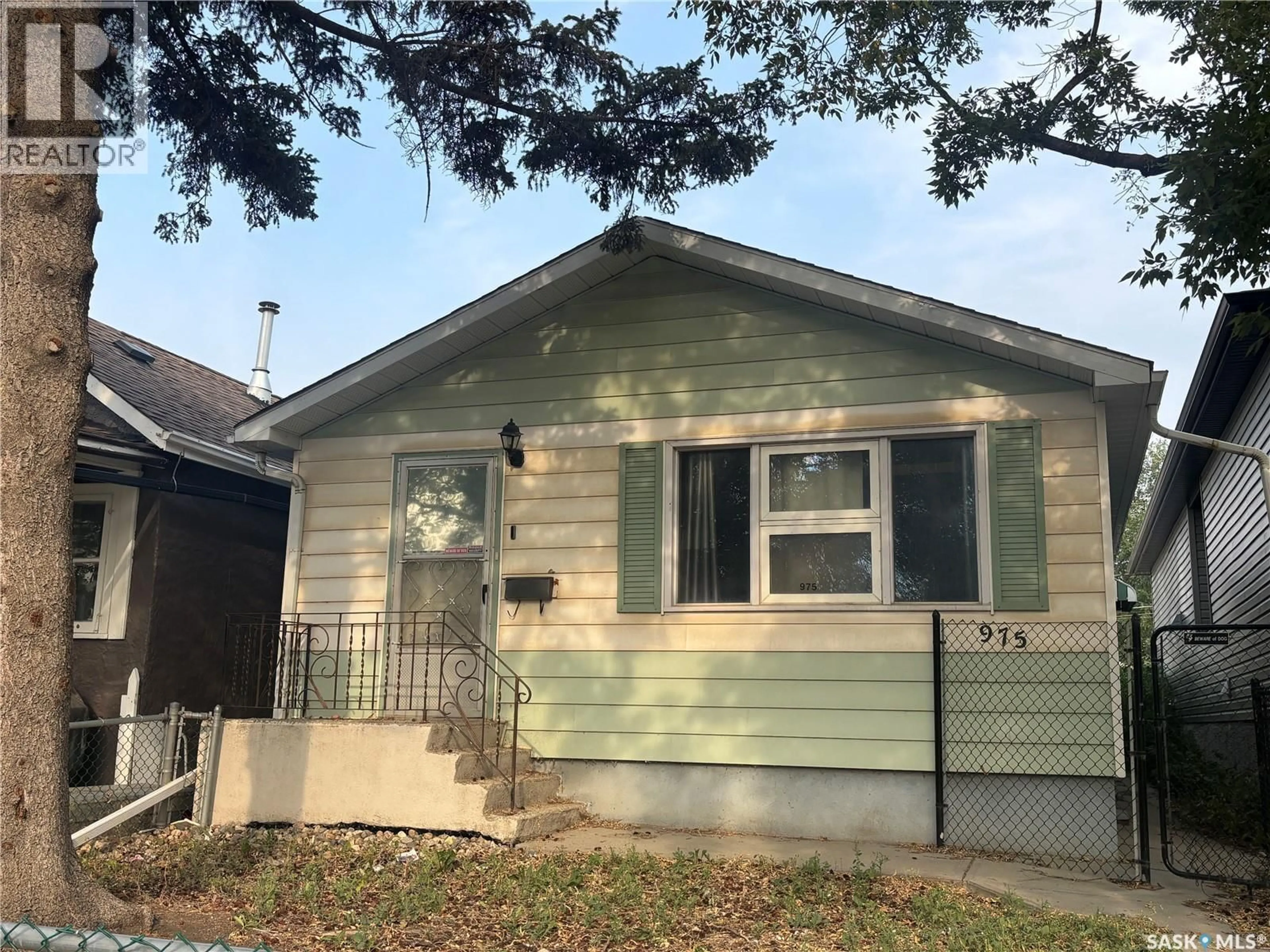 Home with vinyl exterior material, street for 975 ATKINSON STREET, Regina Saskatchewan S4N3V1