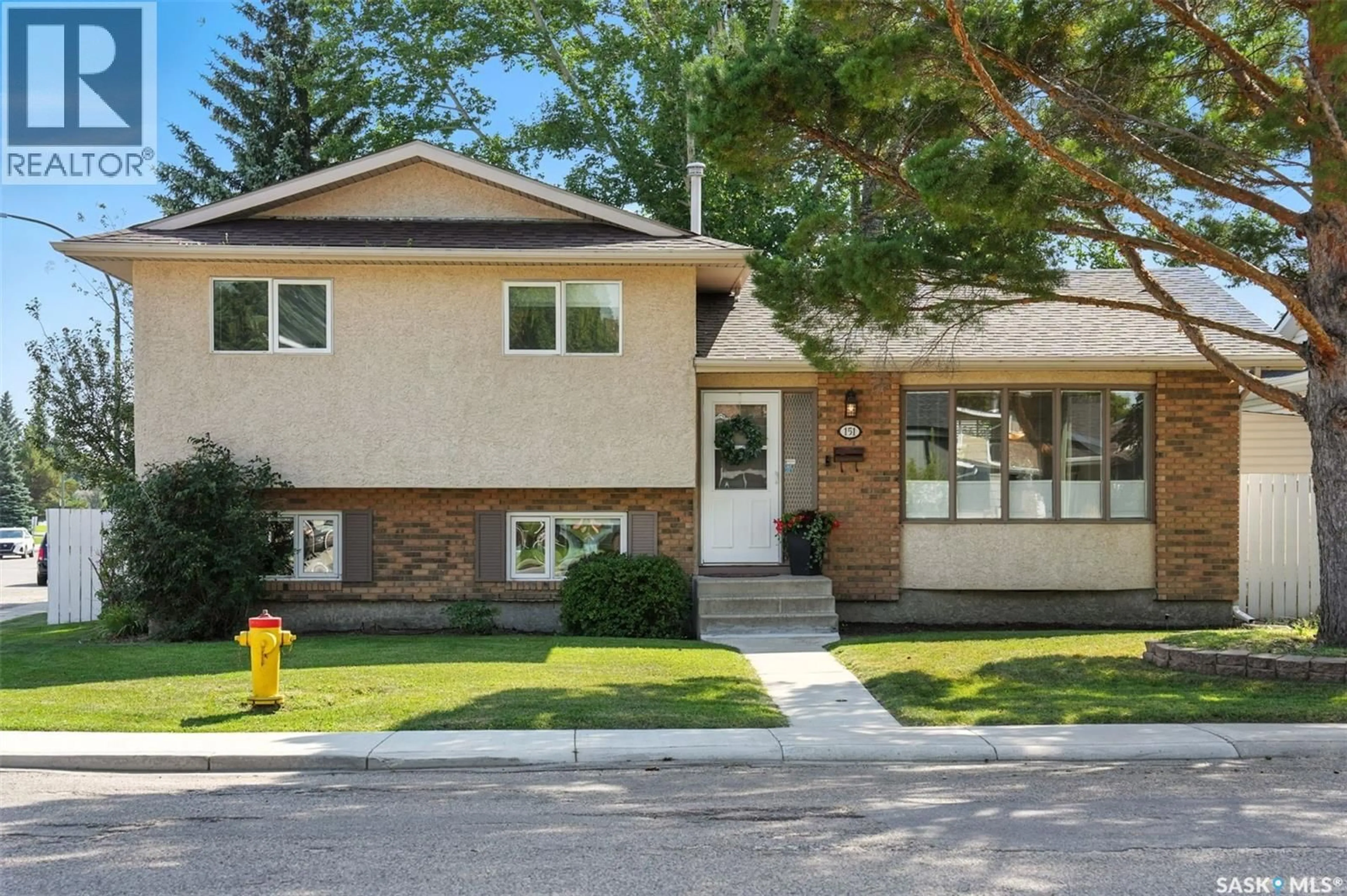 Home with vinyl exterior material, street for 151 ROBORECKI CRESCENT, Saskatoon Saskatchewan S7K5L4