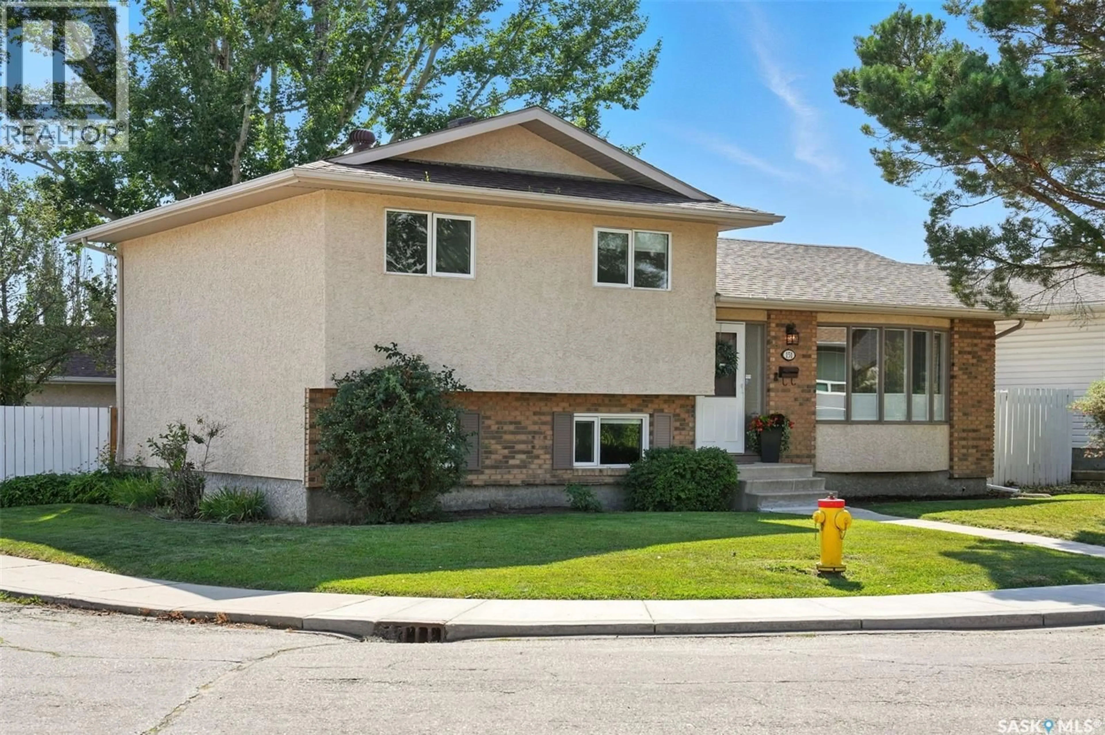 Home with vinyl exterior material, street for 151 ROBORECKI CRESCENT, Saskatoon Saskatchewan S7K5L4