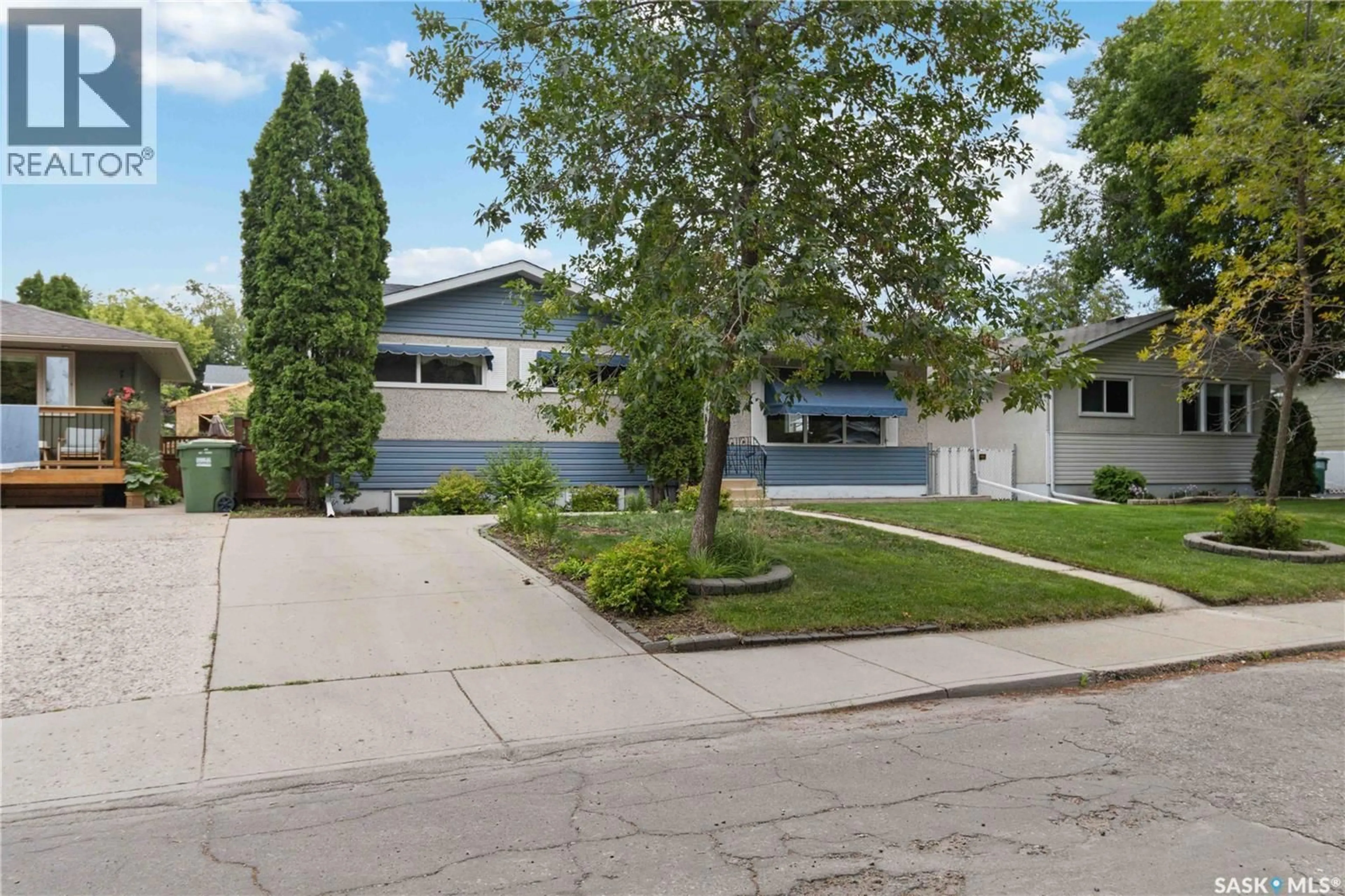 Home with vinyl exterior material, street for 106 PHILLIPS CRESCENT, Saskatoon Saskatchewan S7H3N1