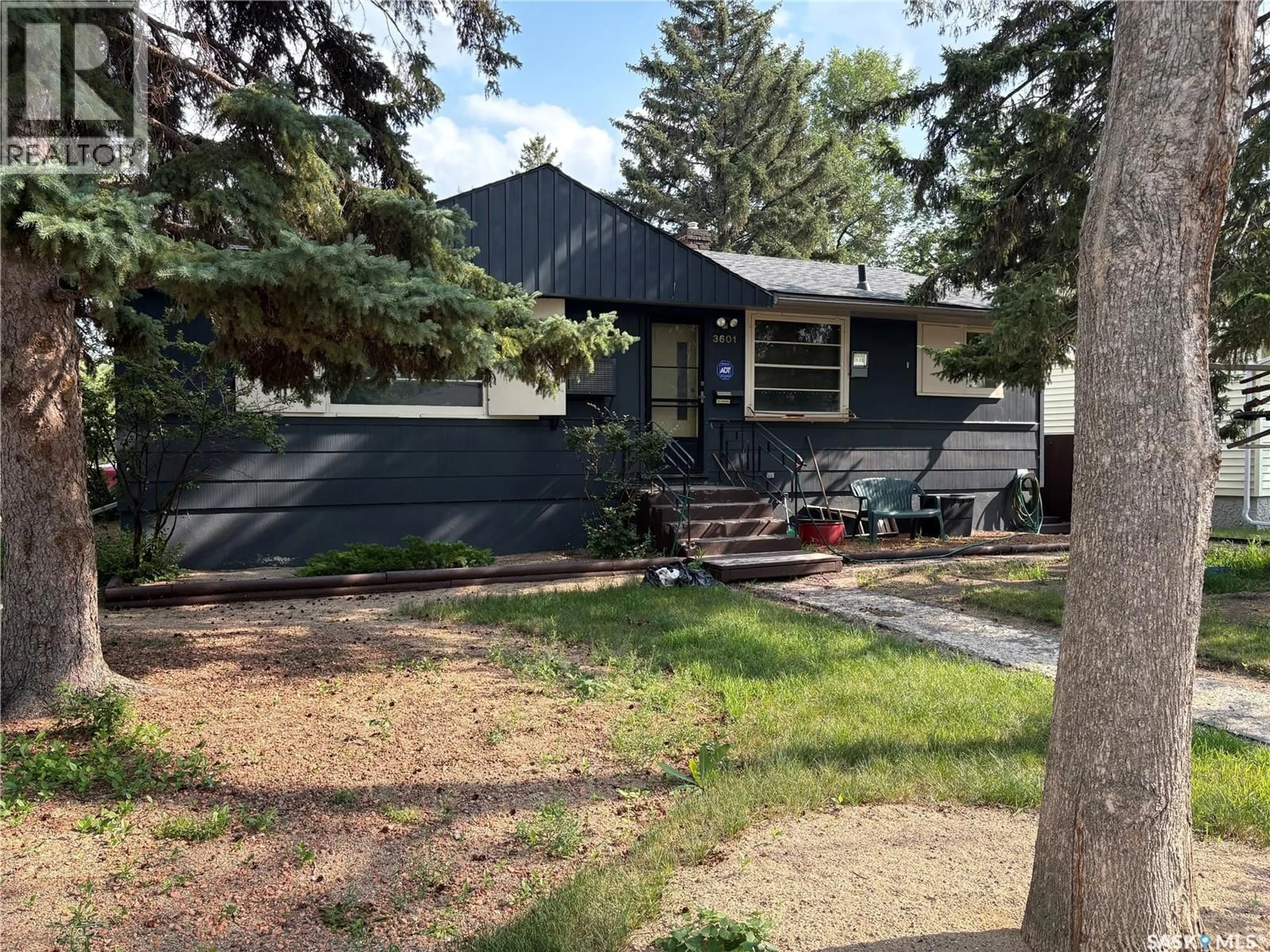 Home with vinyl exterior material, street for 3601 21ST AVENUE, Regina Saskatchewan S4S0V3