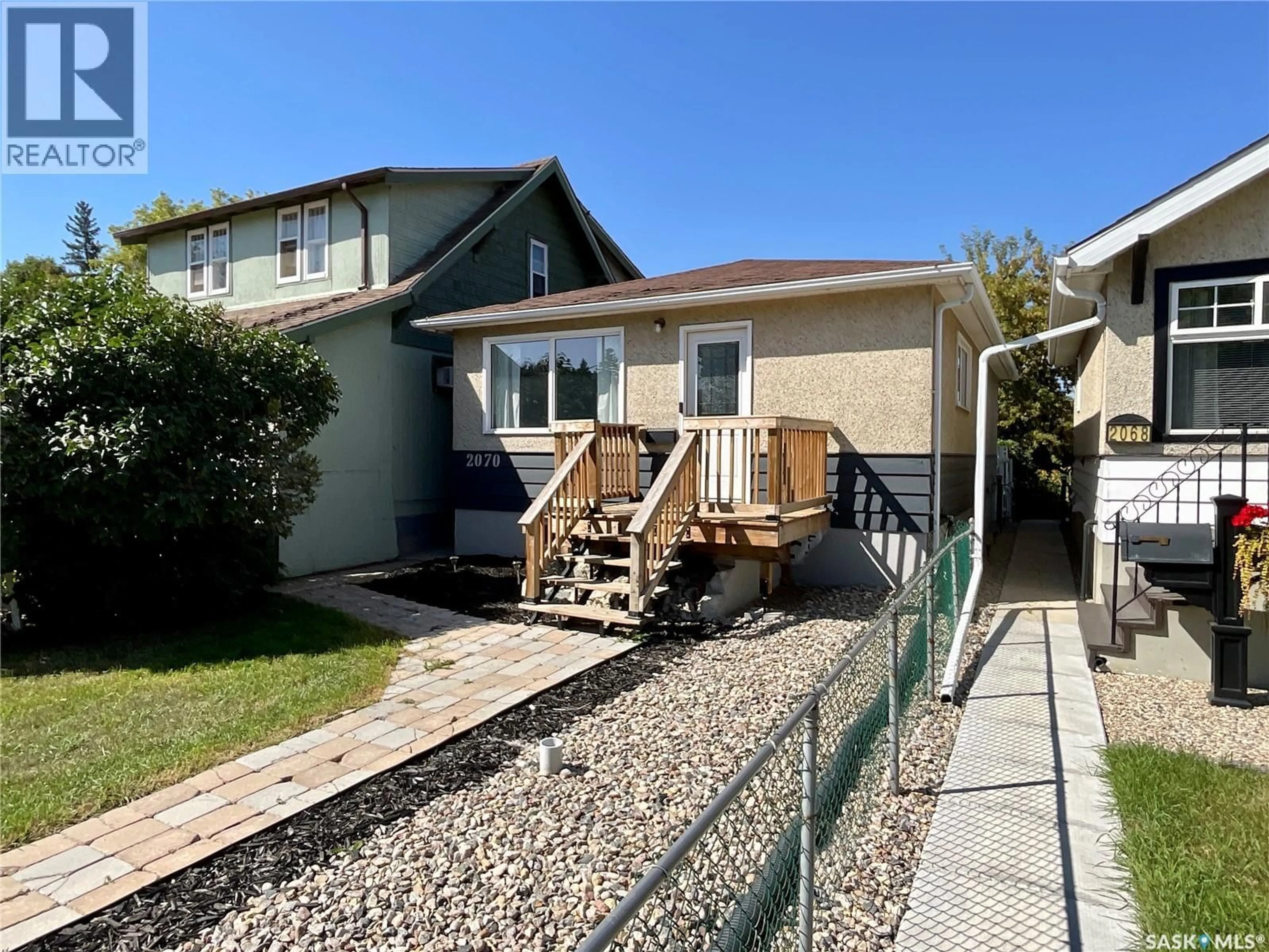 A pic from outside/outdoor area/front of a property/back of a property/a pic from drone, street for 2070 LINDSAY STREET, Regina Saskatchewan S4N3B7