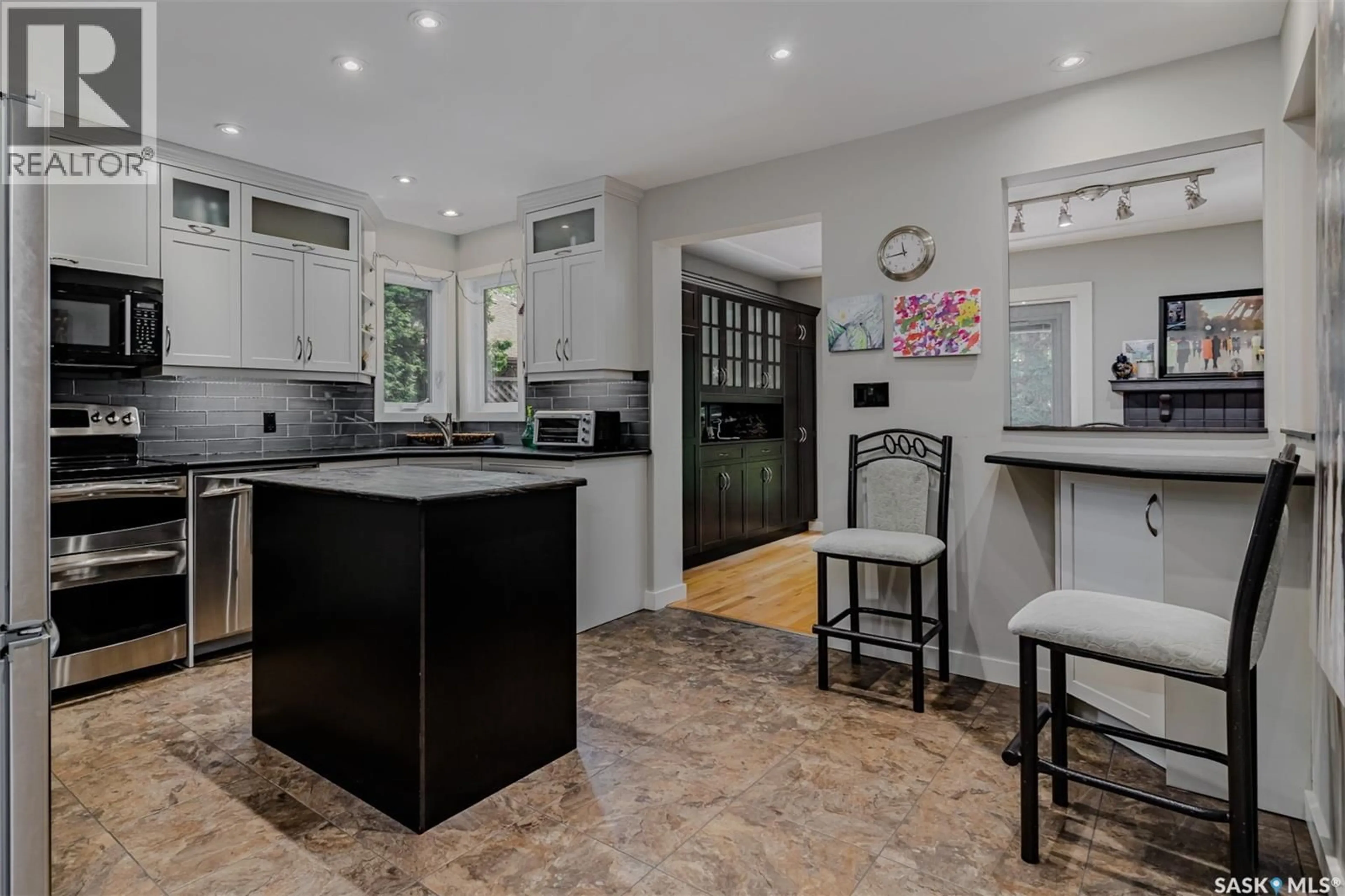 Open concept kitchen, ceramic/tile floor for 203 - 415 HERITAGE CRESCENT, Saskatoon Saskatchewan S7H5M5