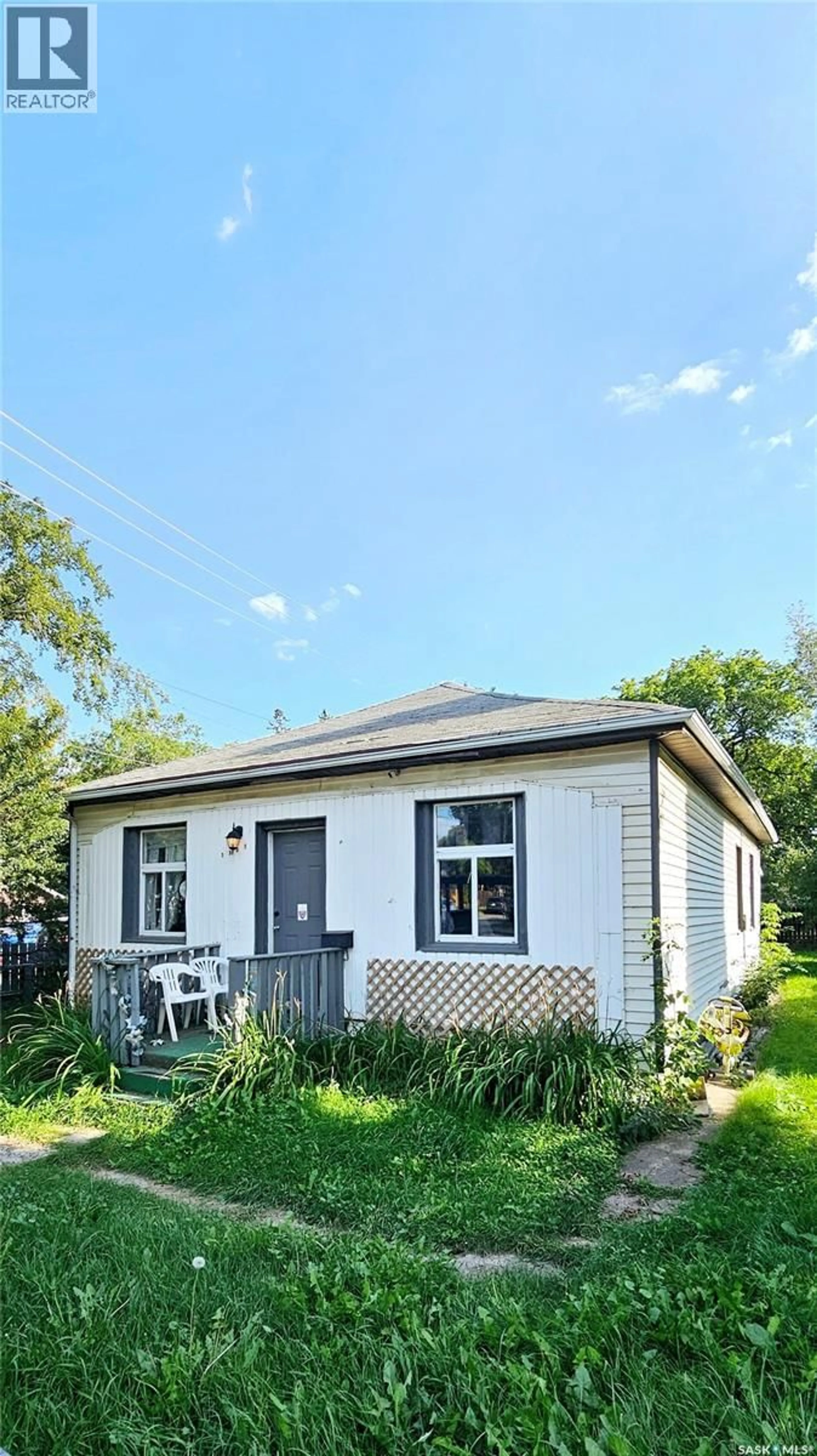 Home with vinyl exterior material, street for 1901 20TH STREET, Saskatoon Saskatchewan S7M1A3