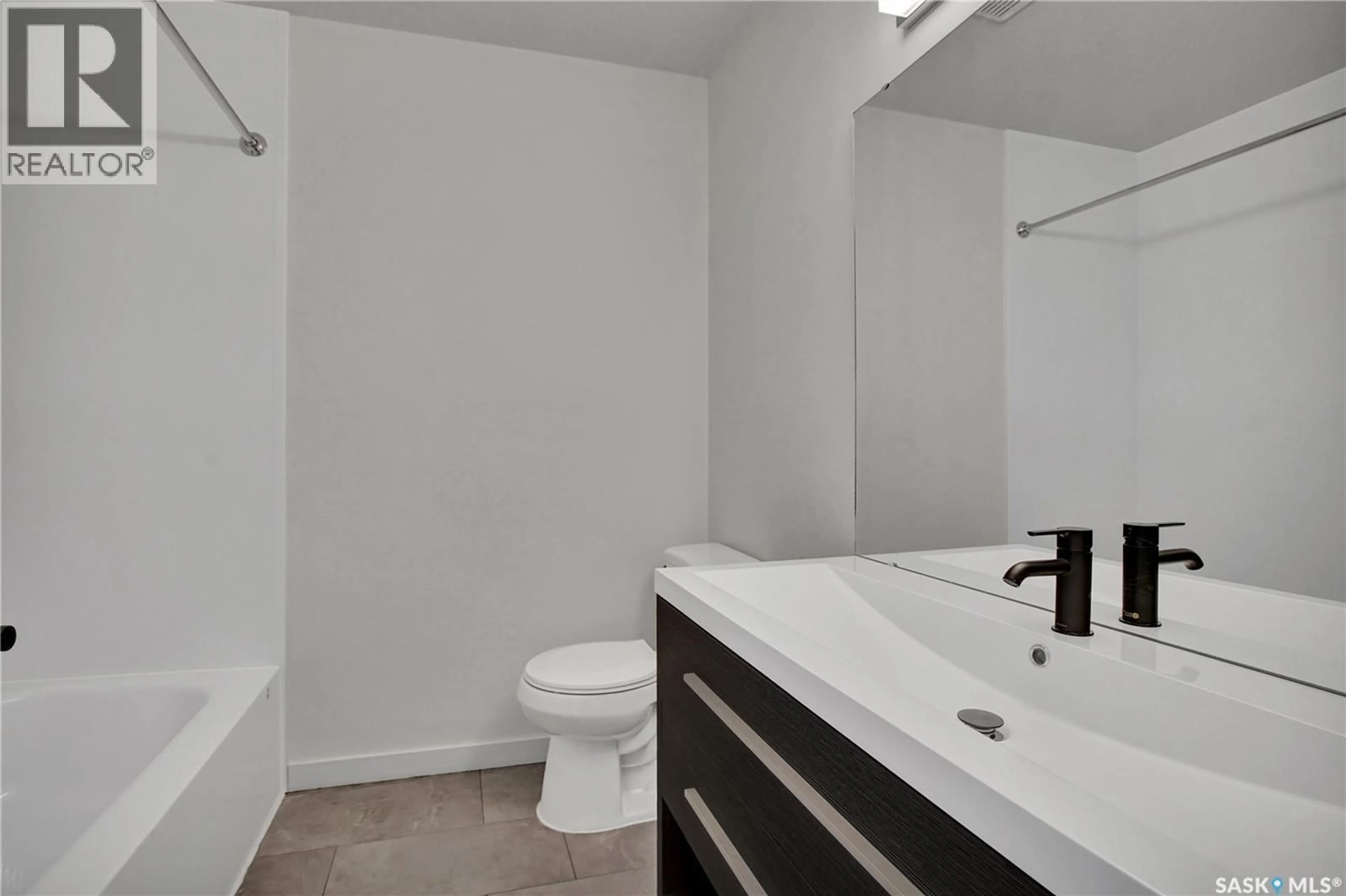 Standard bathroom, ceramic/tile floor for 404 NORTH RAILWAY STREET, Warman Saskatchewan S0K4S0