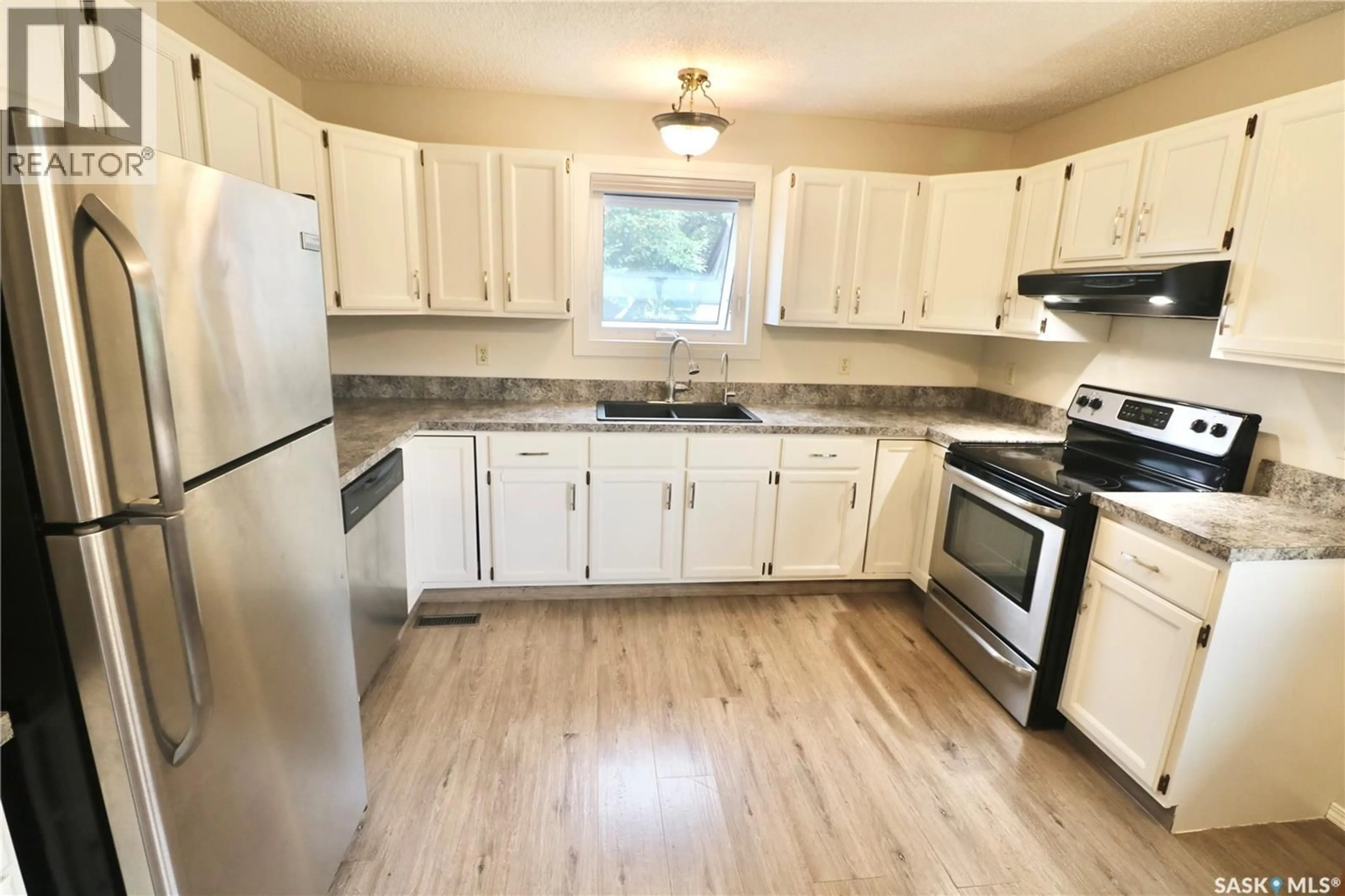 Standard kitchen, wood/laminate floor for 218 1ST STREET, Lang Saskatchewan S0G2W0