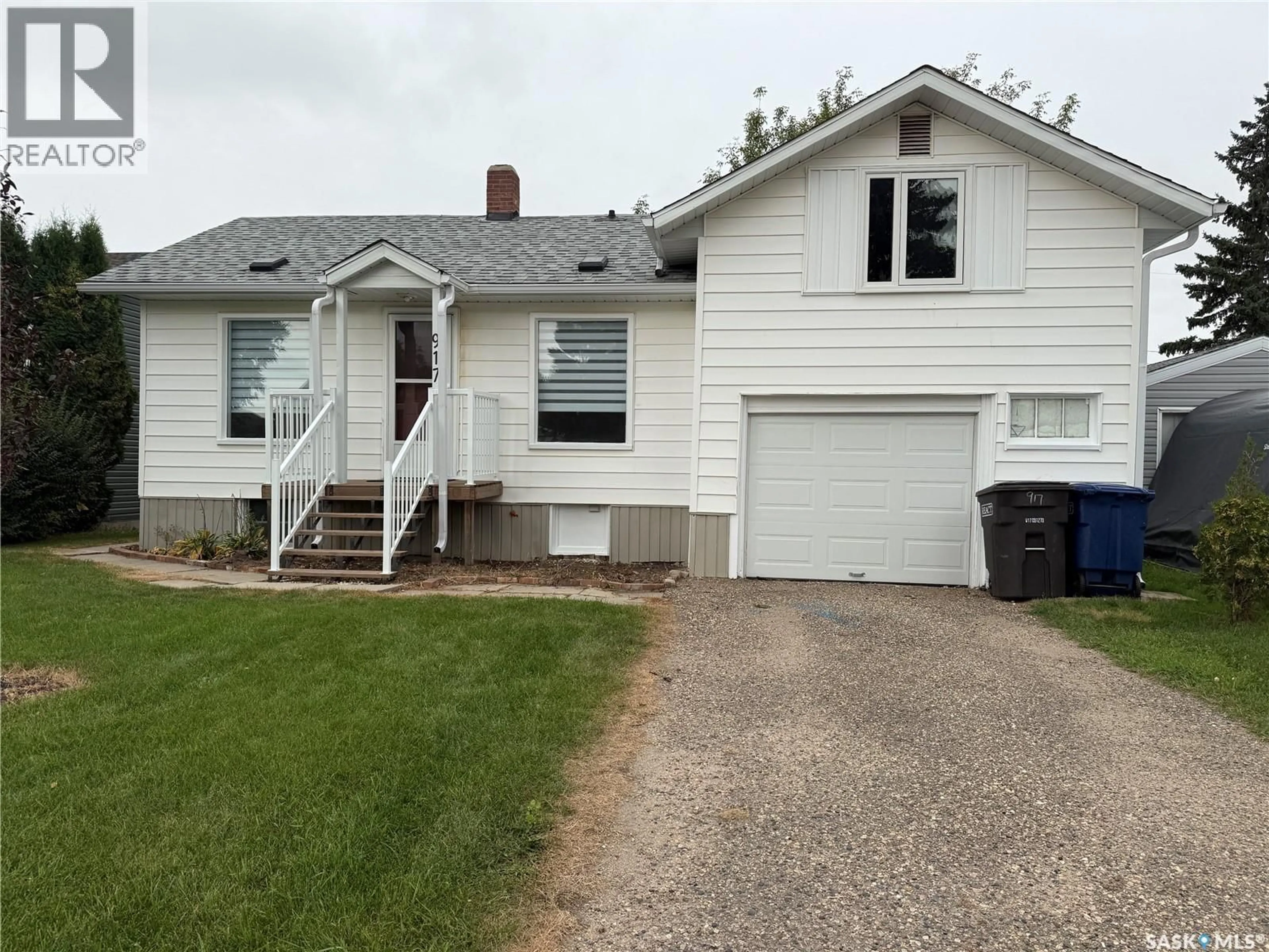 Home with vinyl exterior material, street for 917 13TH STREET, Humboldt Saskatchewan S0K2A0