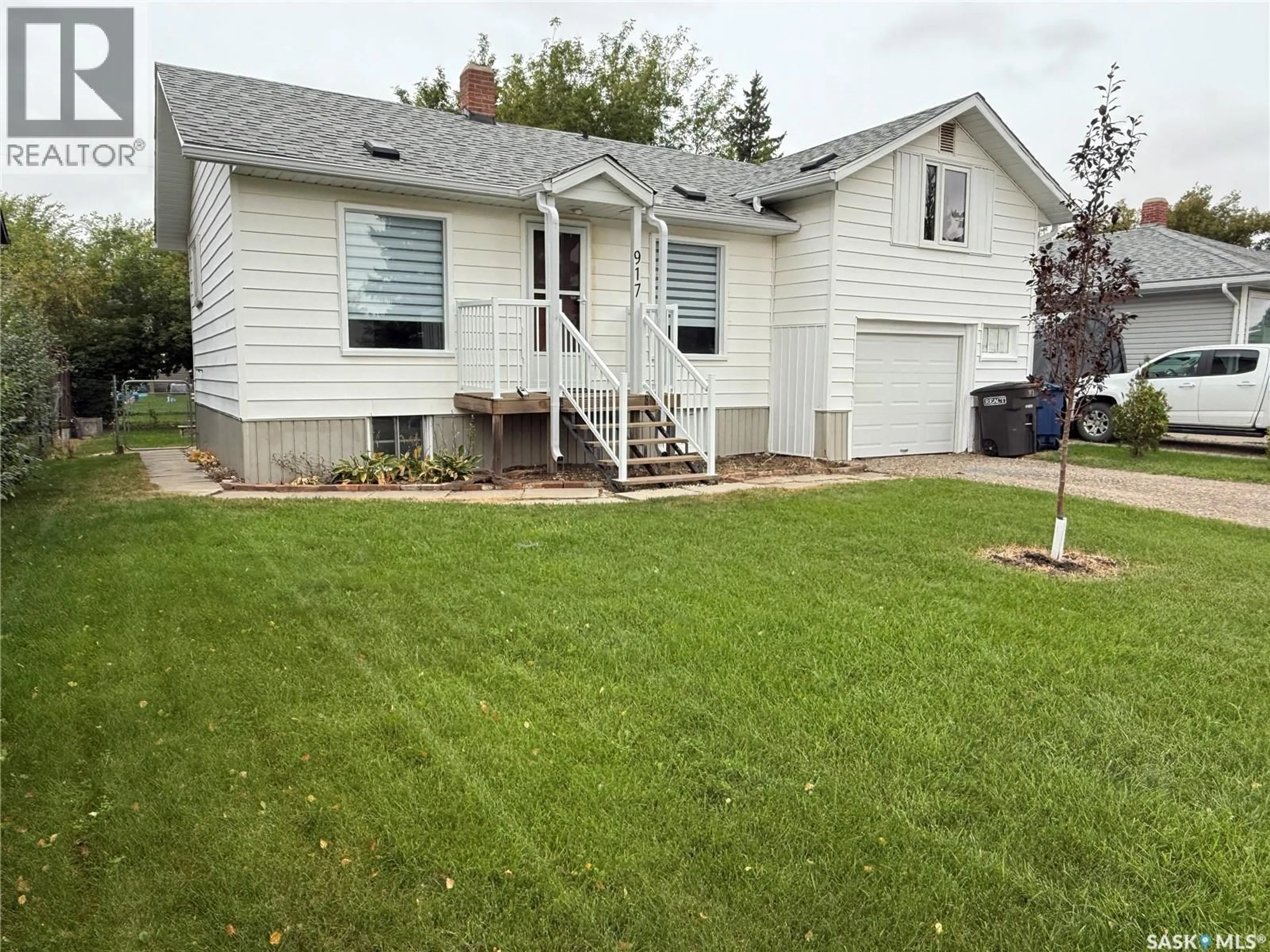 Home with vinyl exterior material, street for 917 13TH STREET, Humboldt Saskatchewan S0K2A0