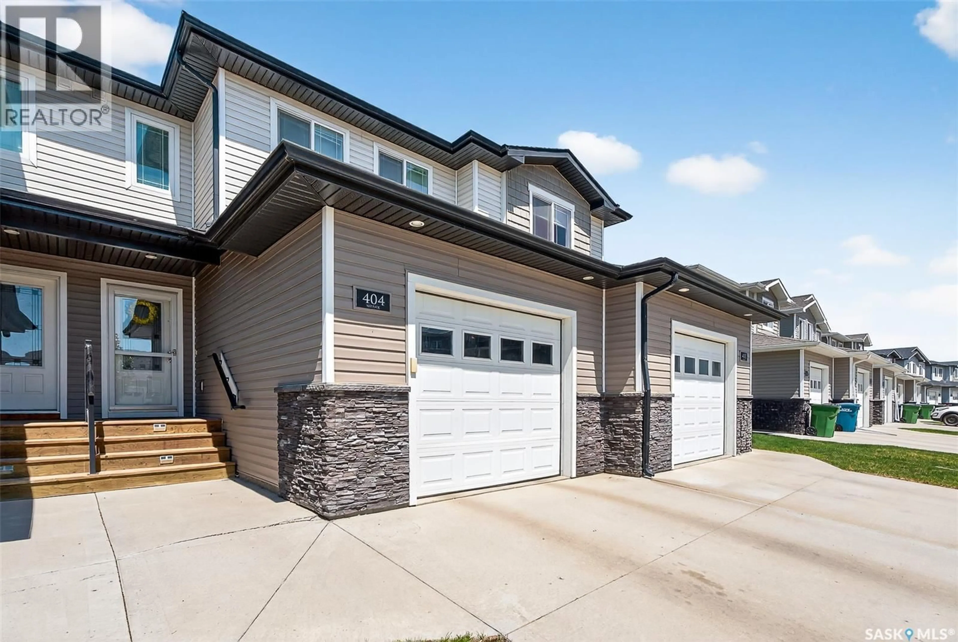 Home with brick exterior material, street for 404 BRADLEY STREET, Moose Jaw Saskatchewan S6H3M4