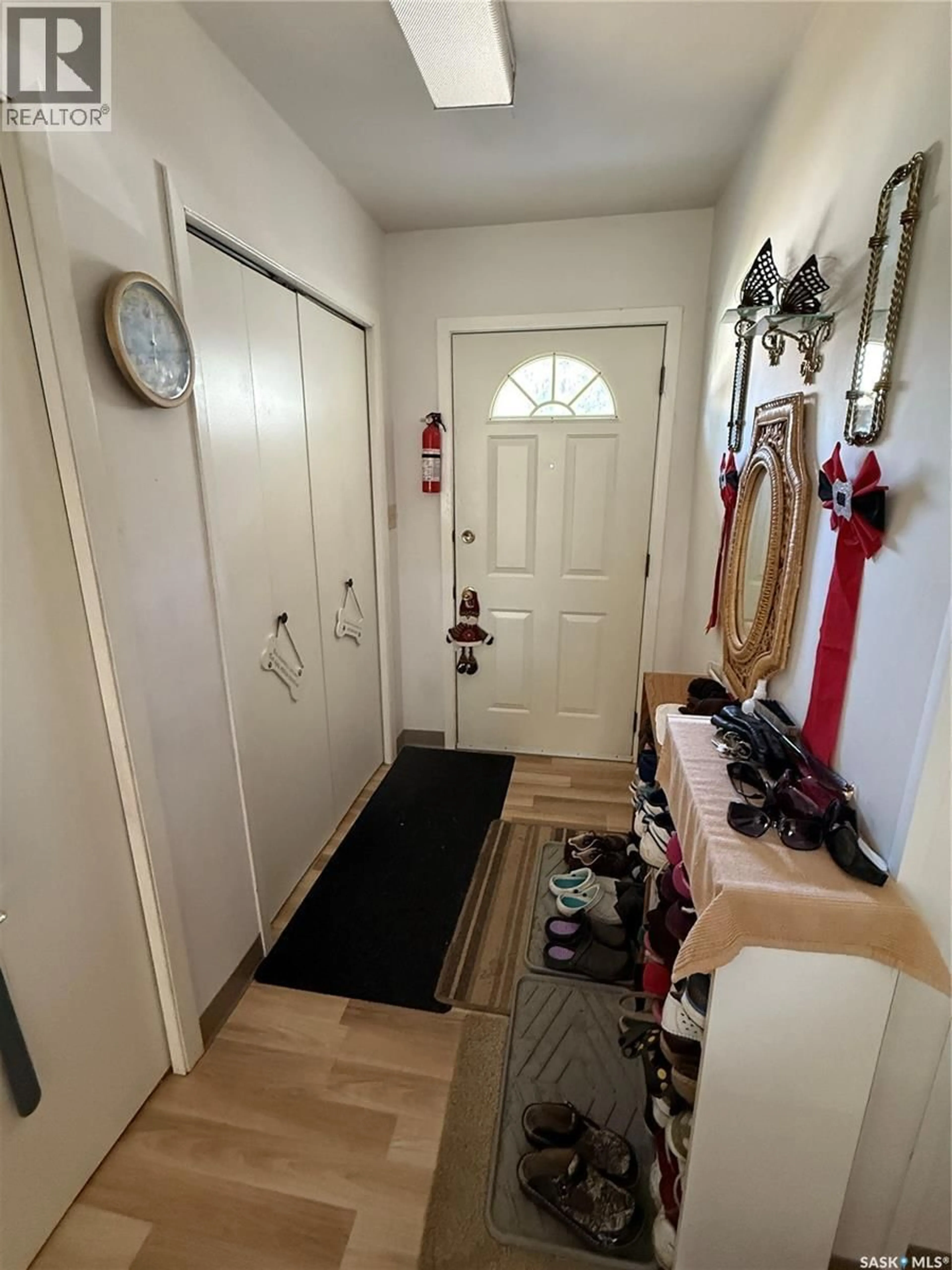 Indoor entryway for 705 1ST AVENUE, Weyburn Saskatchewan S4H1P4
