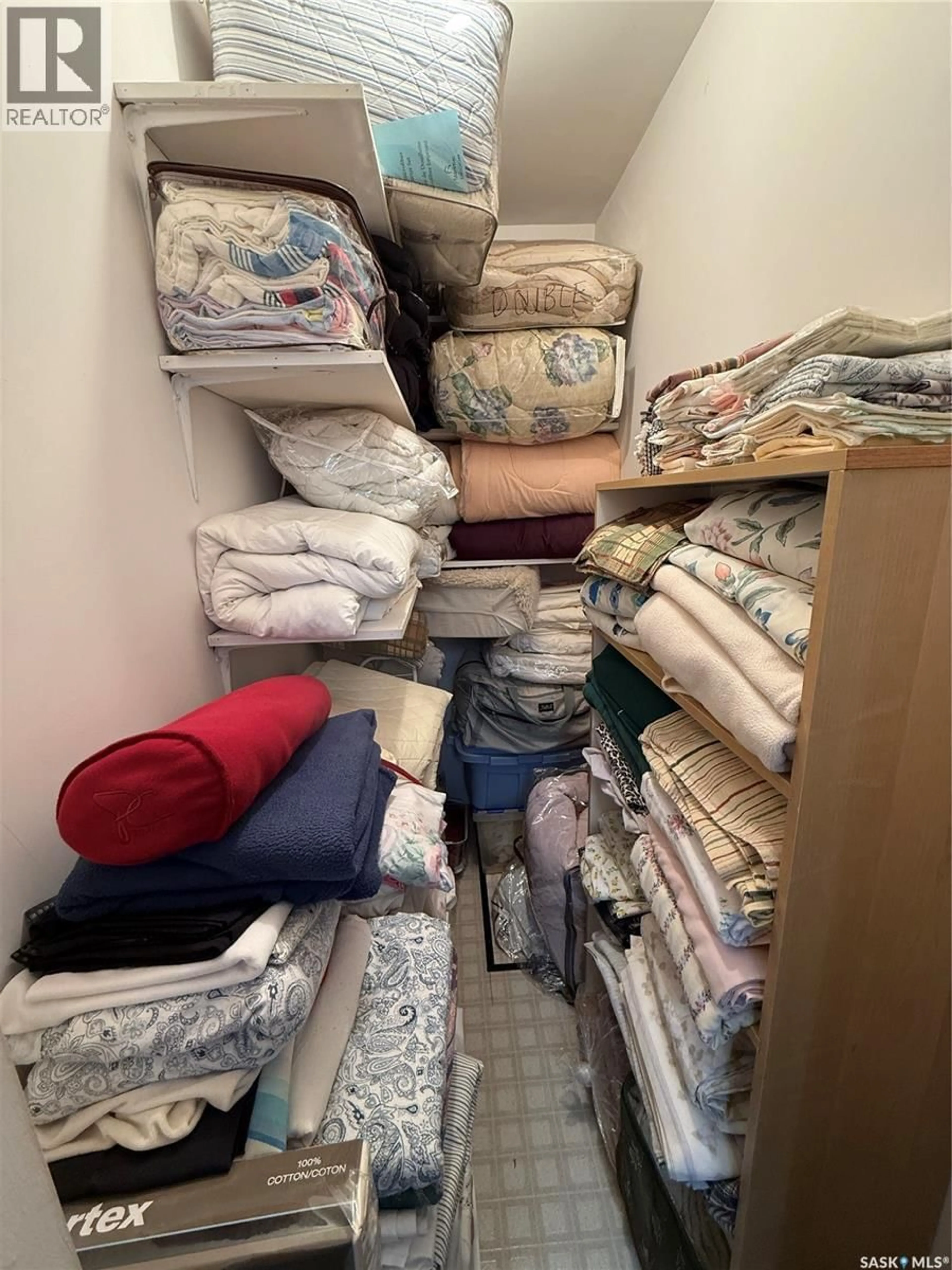 Storage room or clothes room or walk-in closet for 705 1ST AVENUE, Weyburn Saskatchewan S4H1P4