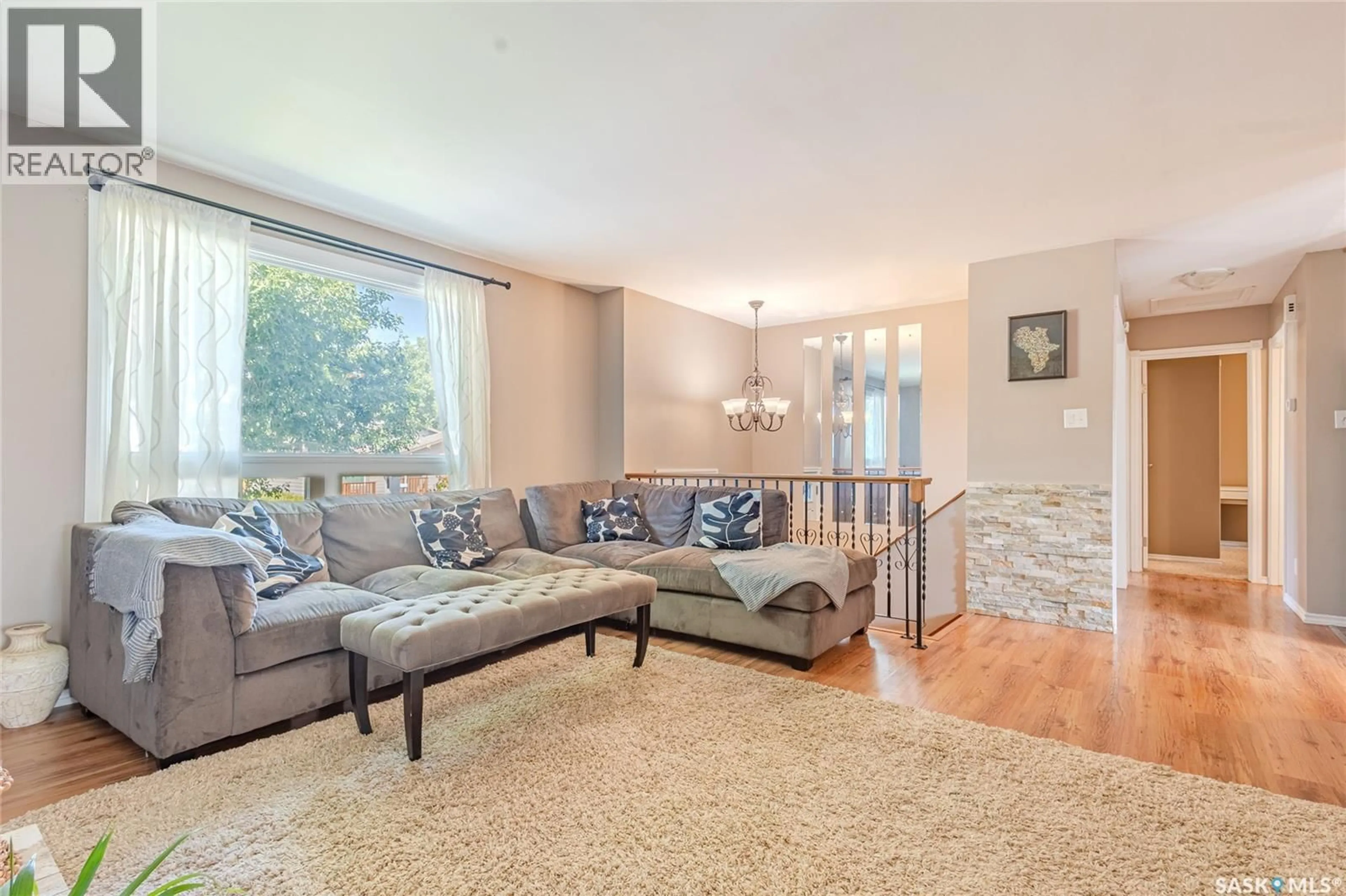 Living room with furniture, unknown for 419 STREB WAY, Saskatoon Saskatchewan S7M4V2
