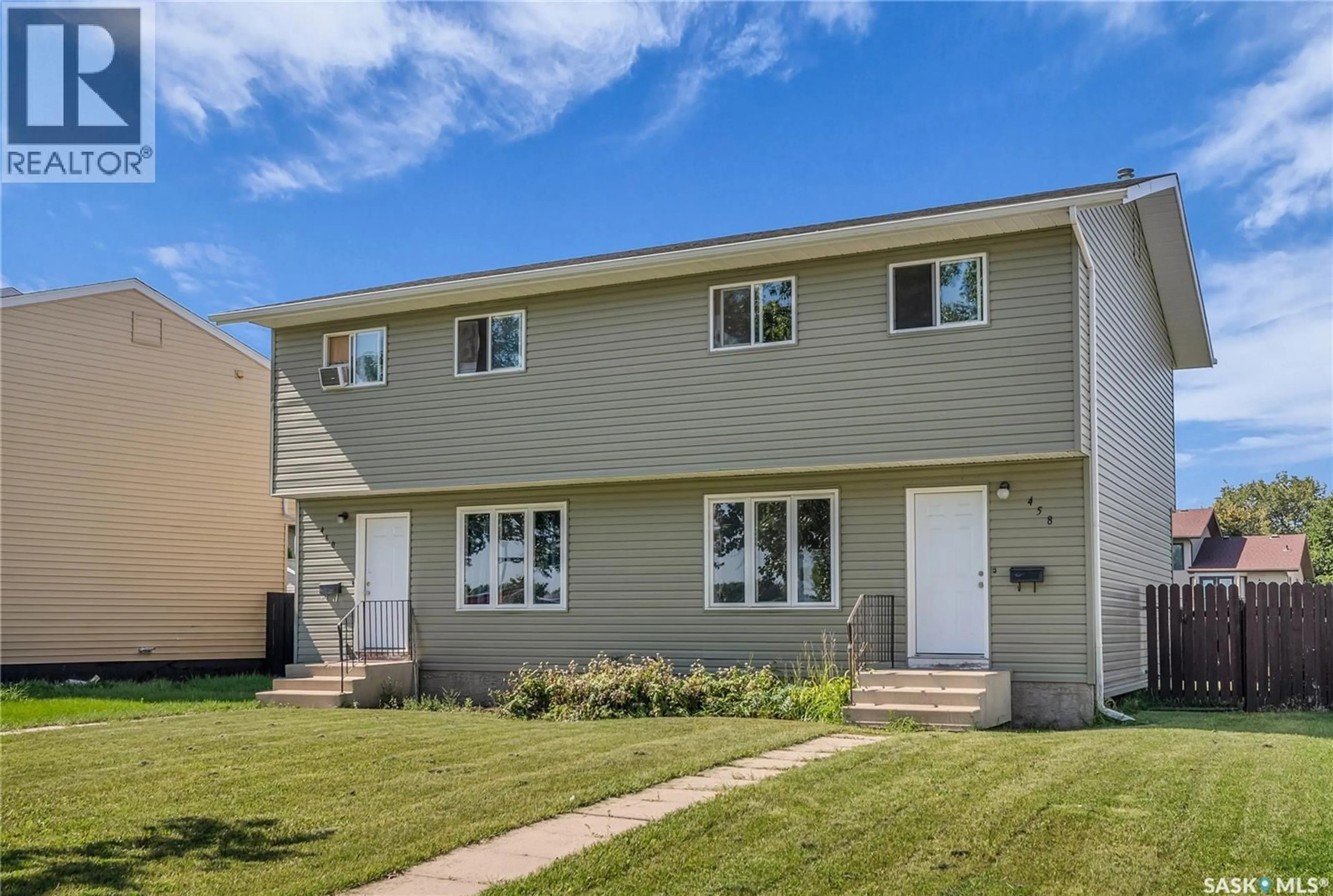 Home with vinyl exterior material, street for 458 & 460 BERINI DRIVE, Saskatoon Saskatchewan S7N3N6