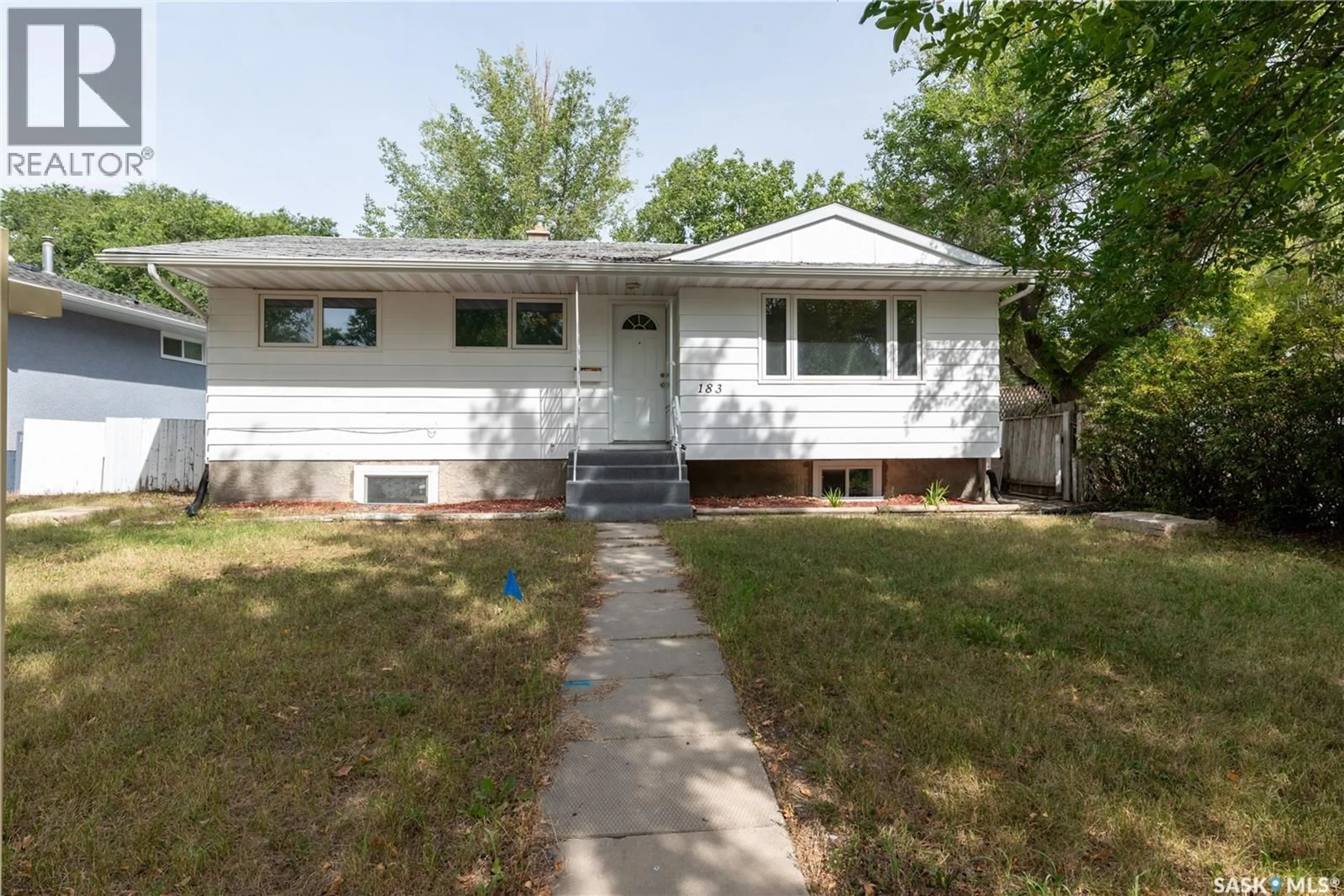 Home with vinyl exterior material, street for 183 MAGEE CRESCENT, Regina Saskatchewan S4R6K6