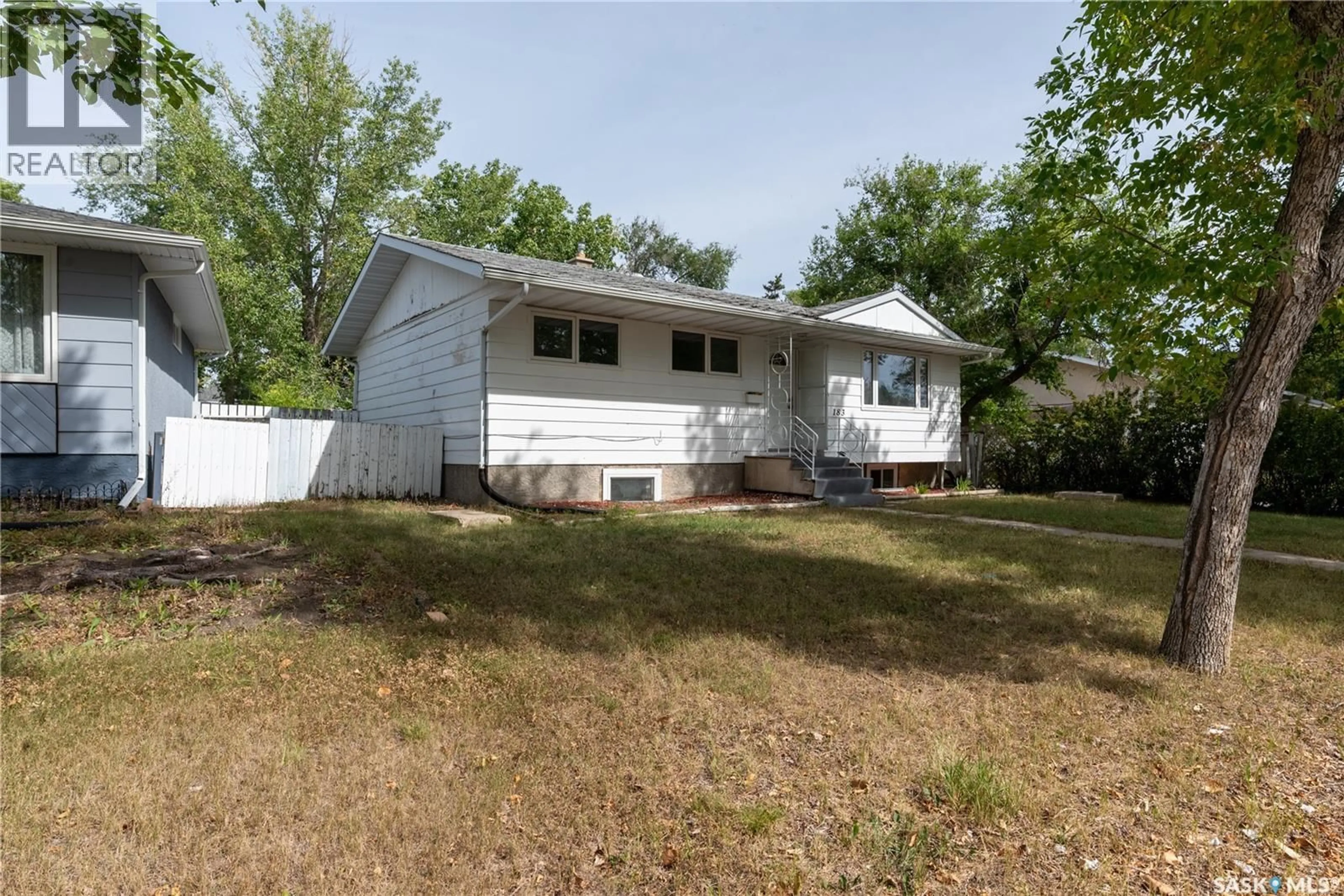 Home with vinyl exterior material, street for 183 MAGEE CRESCENT, Regina Saskatchewan S4R6K6