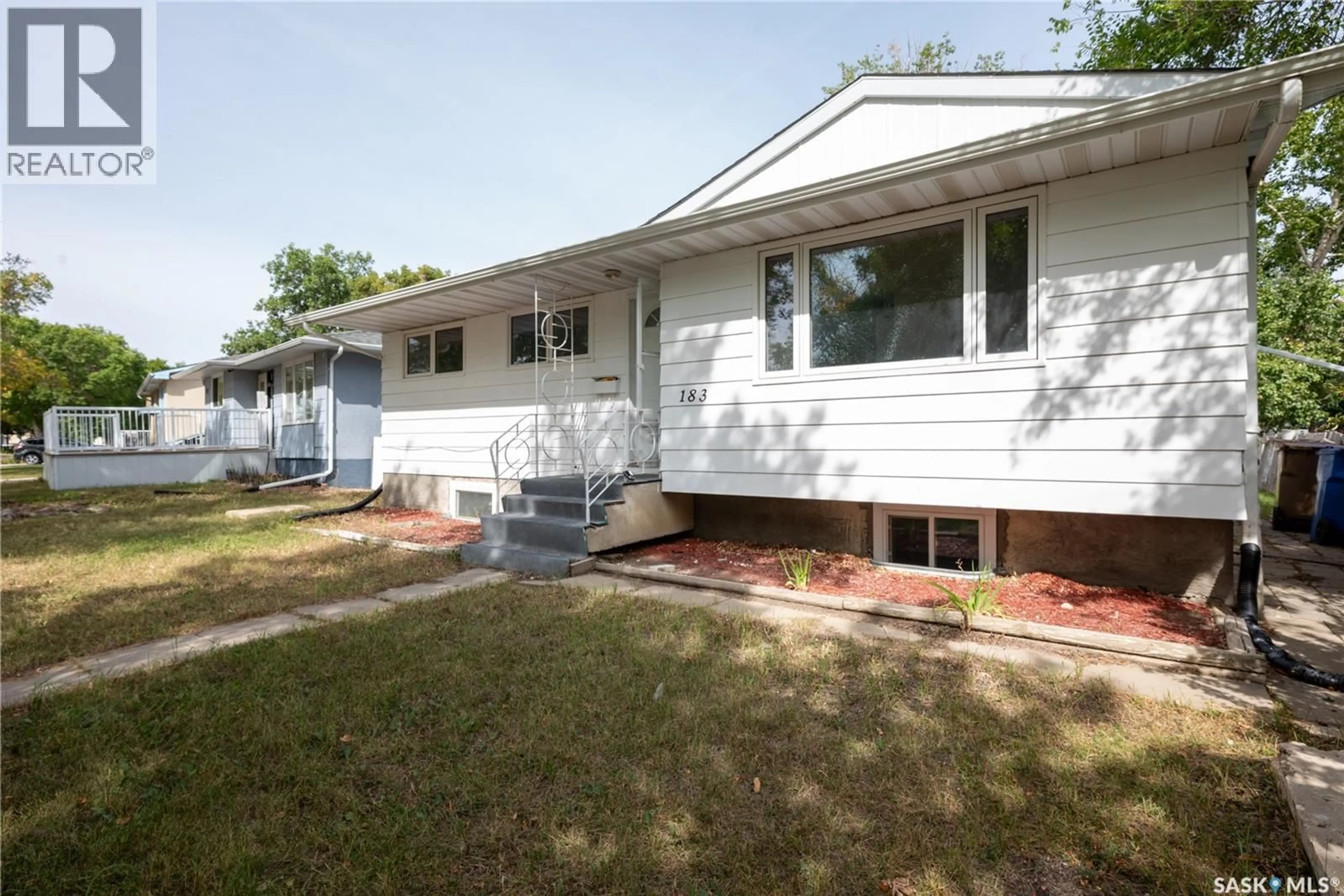 Home with vinyl exterior material, street for 183 MAGEE CRESCENT, Regina Saskatchewan S4R6K6