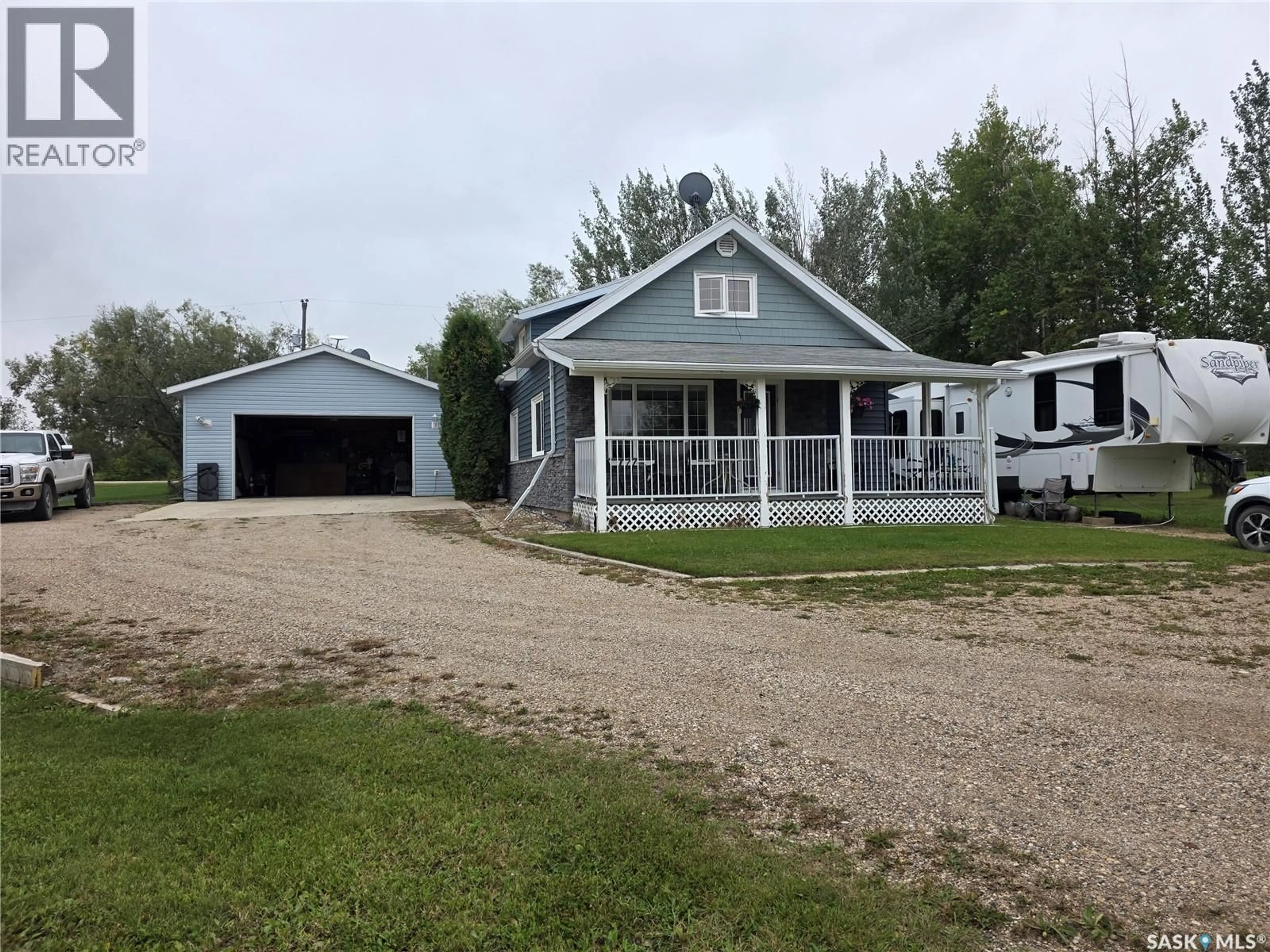 A pic from outside/outdoor area/front of a property/back of a property/a pic from drone, unknown for REID ACREAGE, Big Quill Rm No. 308 Saskatchewan S0A4T0