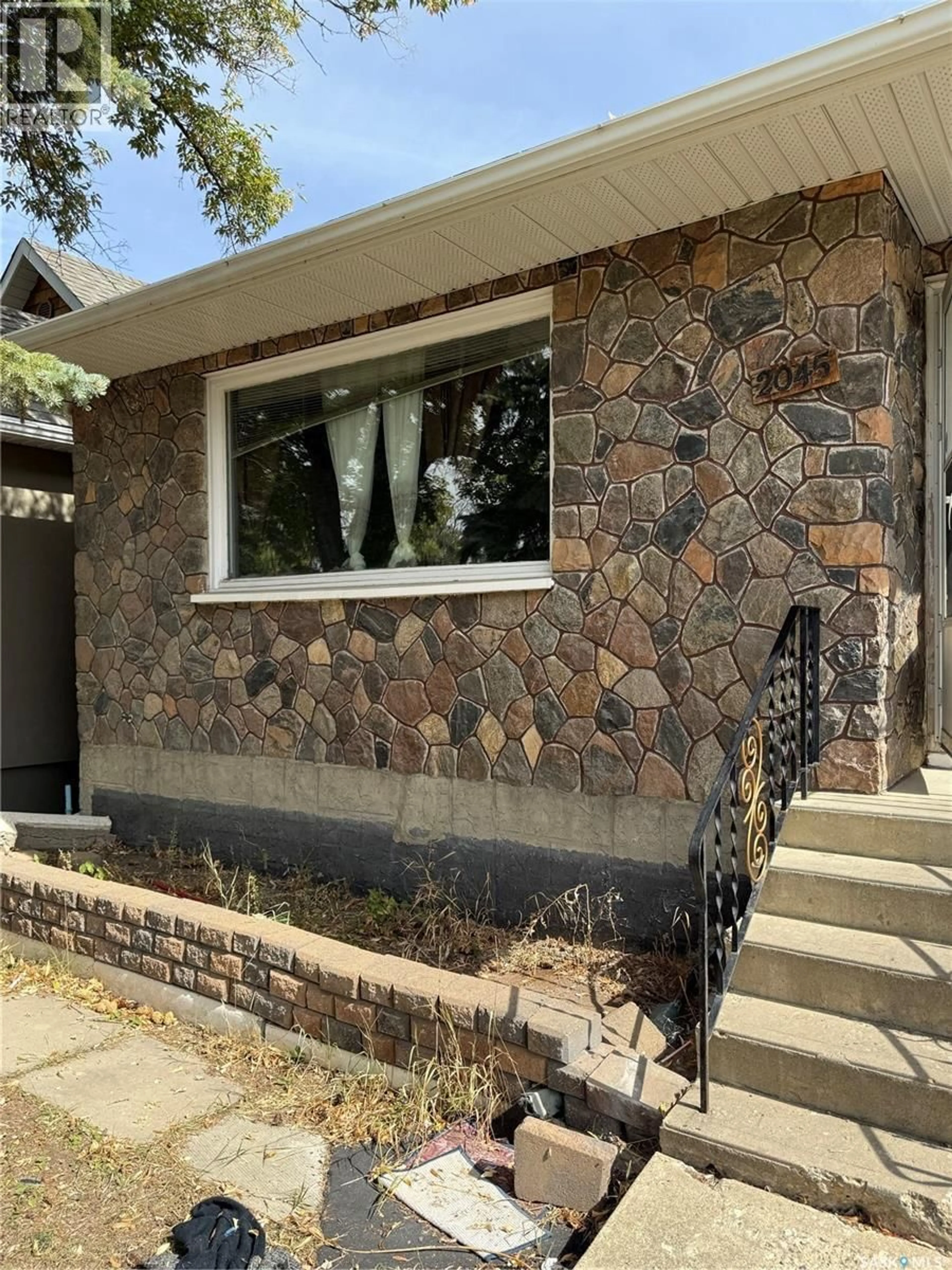 Home with brick exterior material, street for 2045 MONTREAL STREET, Regina Saskatchewan S4P1L5