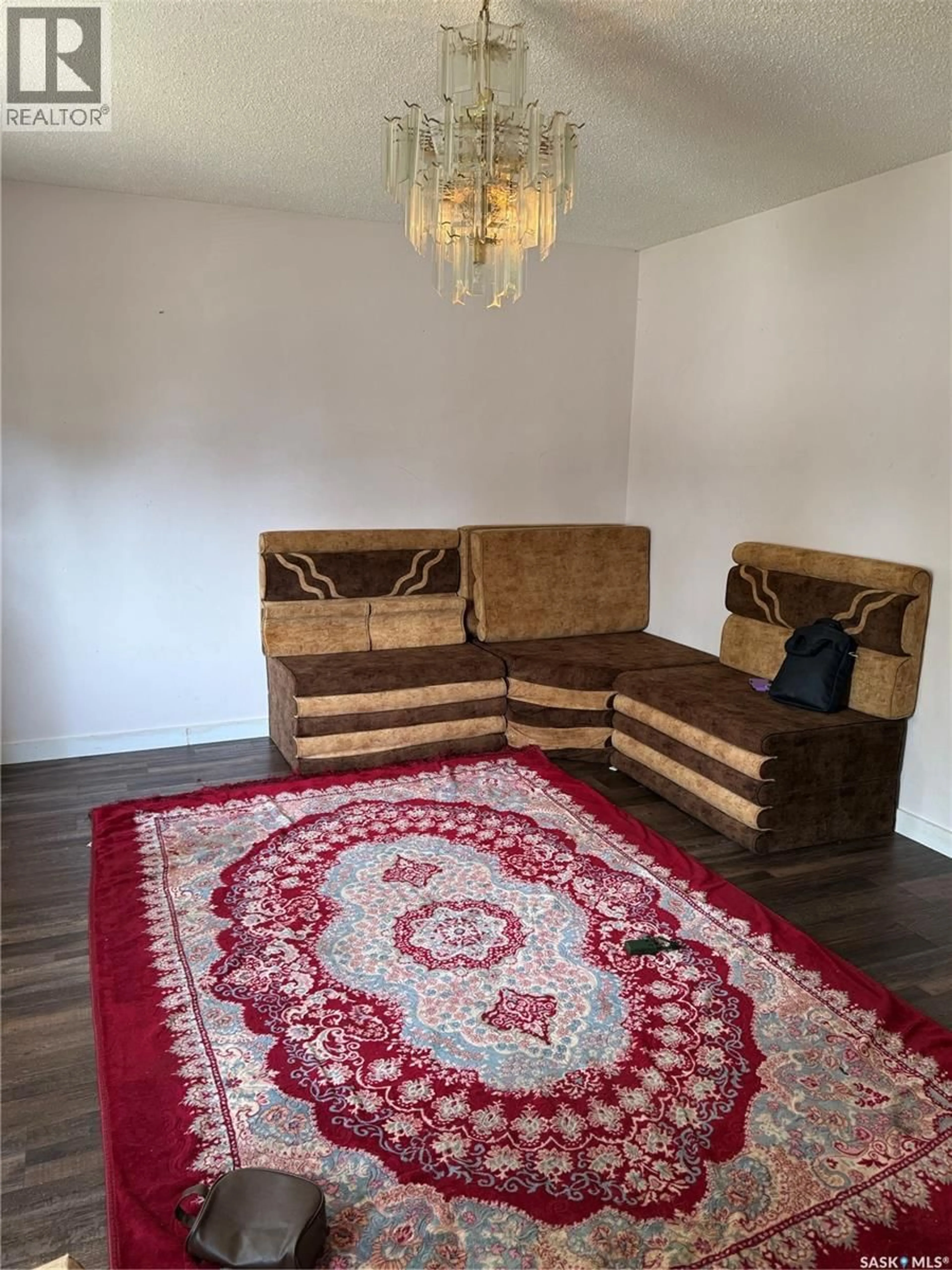 Living room with furniture, carpet floor for 2045 MONTREAL STREET, Regina Saskatchewan S4P1L5
